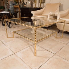 Two tier brass and glass coffee table