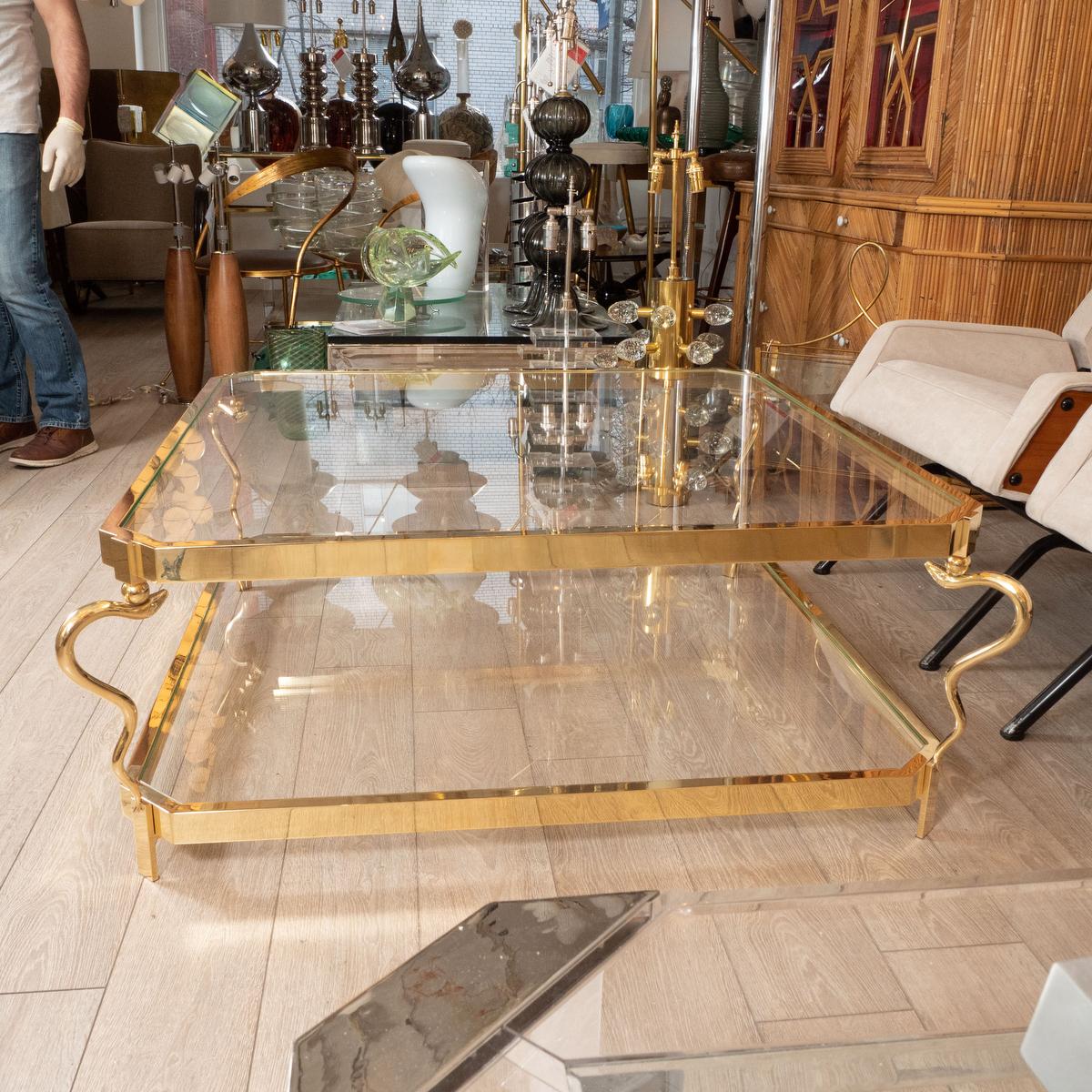 Mid-Century Modern Two-tier brass snake motif coffee tables For Sale