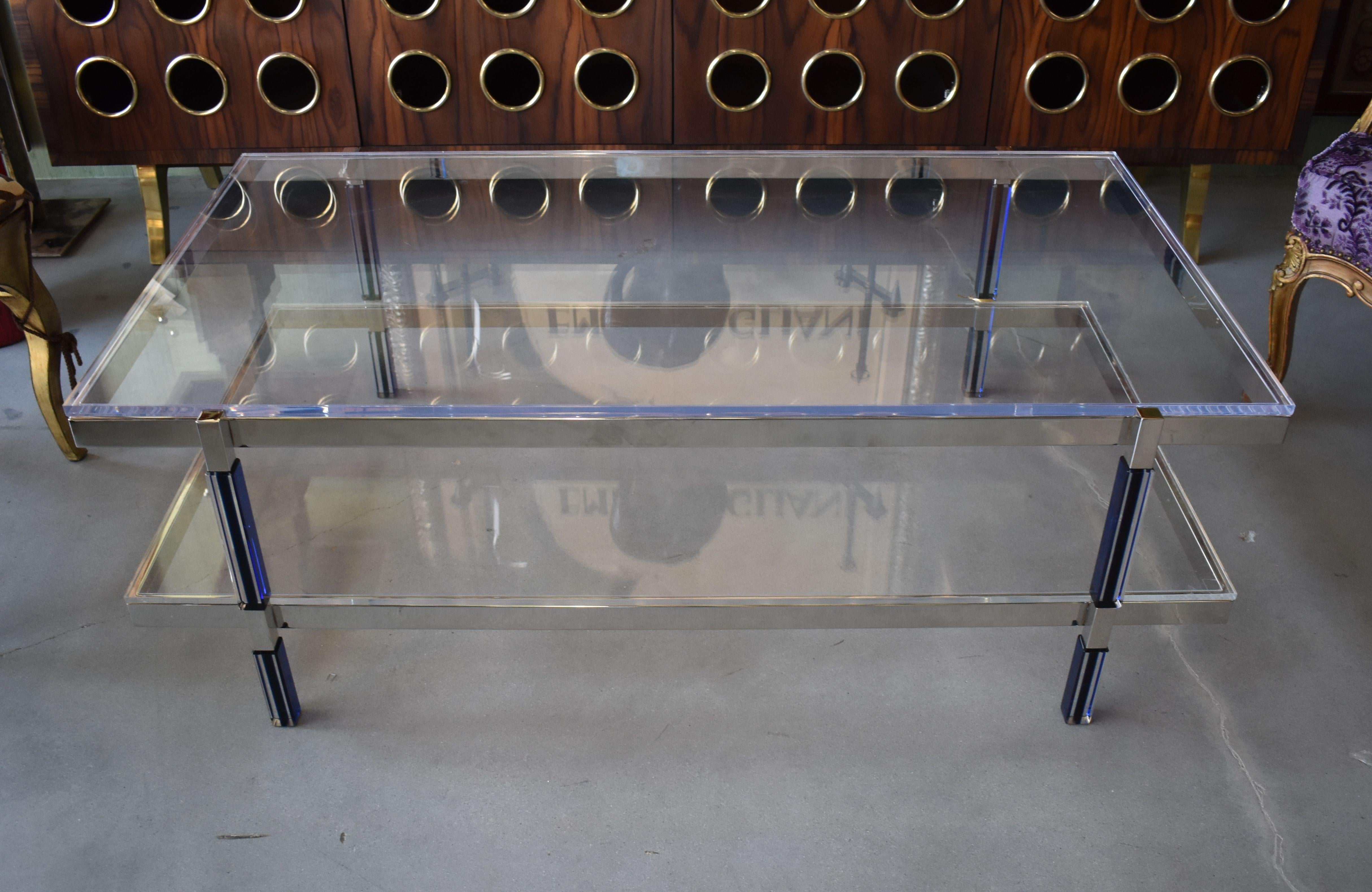 Metric line two-tier blue and clear lucite coffee table with nickel finish frame signed by Charles Hollis Jones 
Provenance directly from Private collection of CHJ.
Charles Hollis Jones Started Metric collection designed in the 1960s.
 