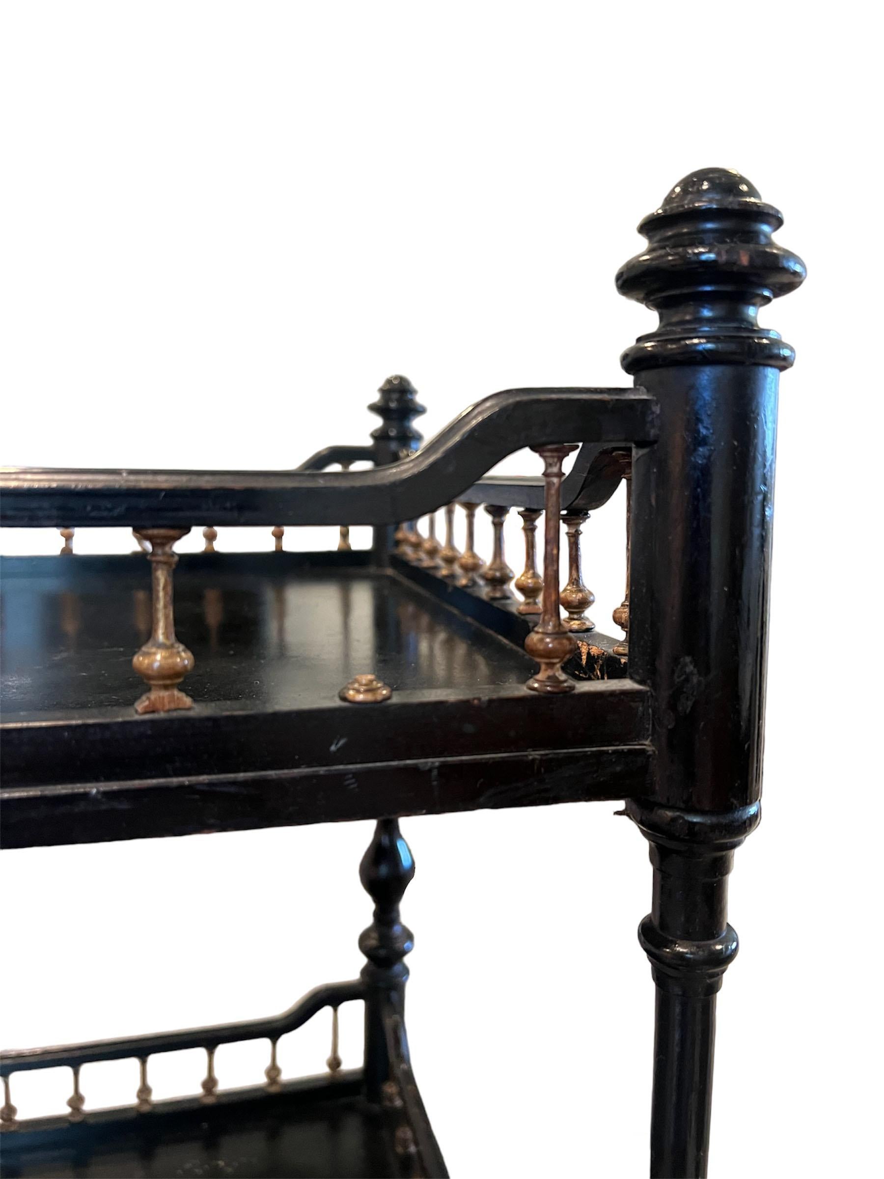 Ebonized Two-Tier Etagere with Casters For Sale