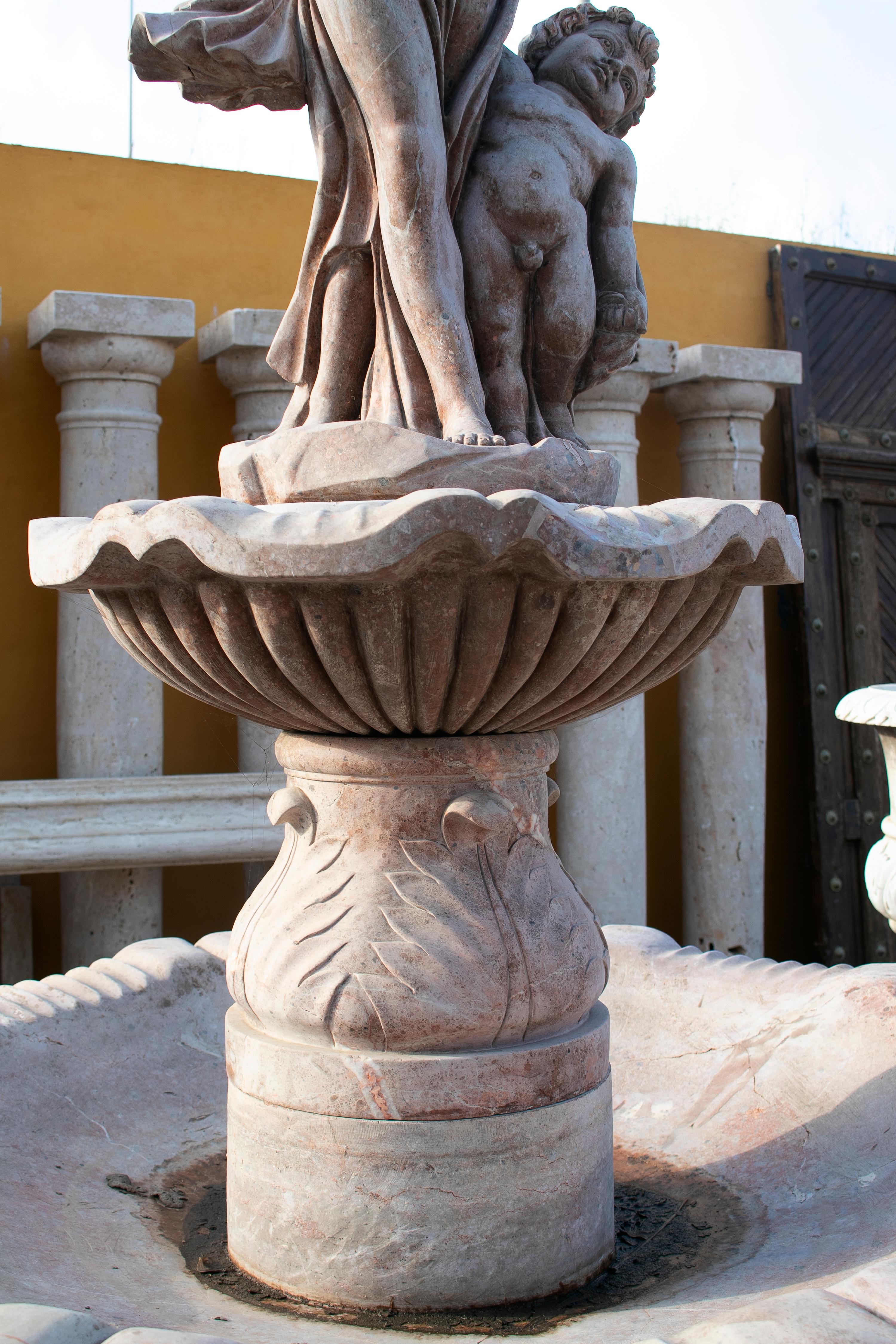 Hand-Carved Two Tier Hand Carved Brown Marble Fountain with Pool and Sculptures