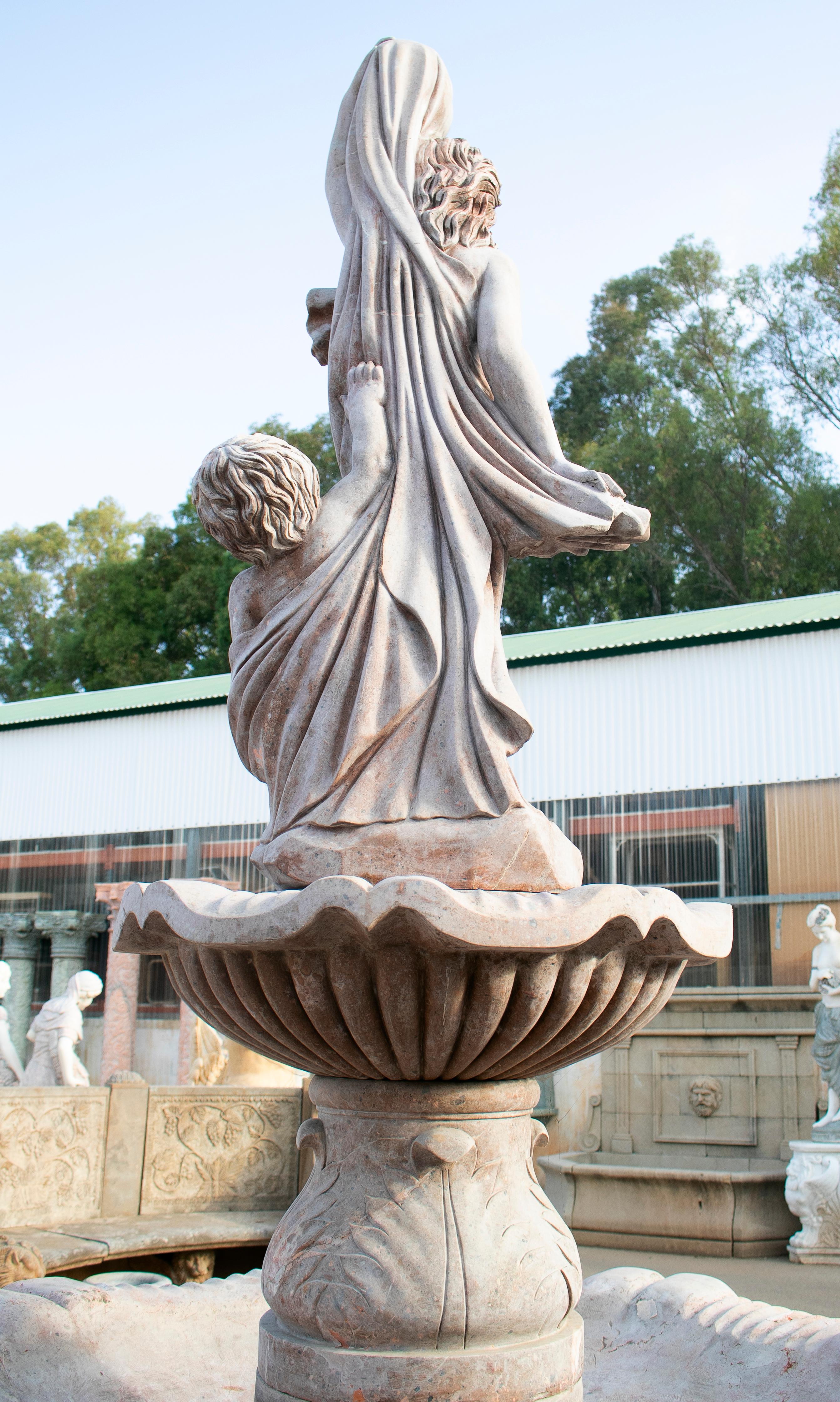 Two Tier Hand Carved Brown Marble Fountain with Pool and Sculptures In Good Condition In Marbella, ES