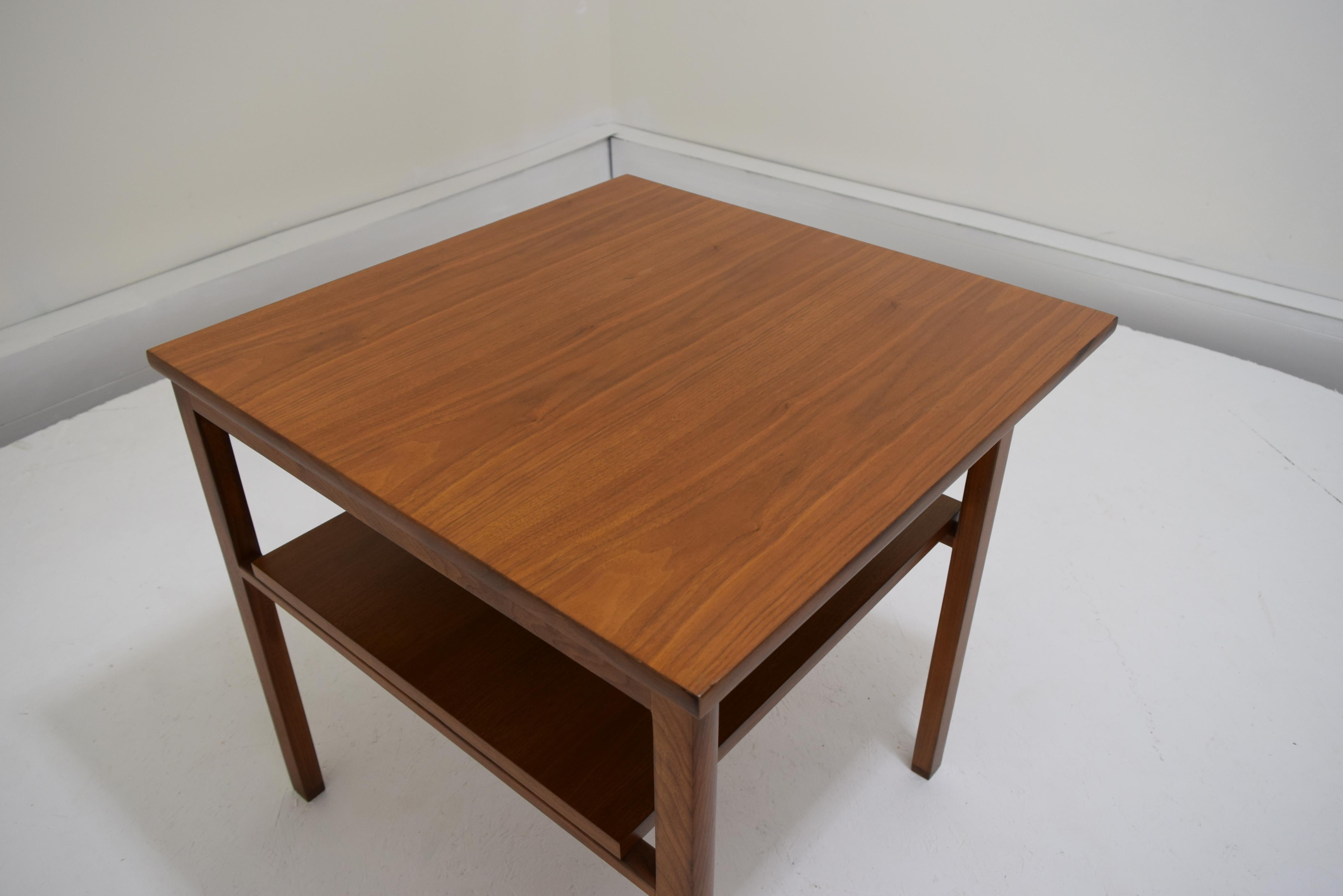 Dunbar, lamp table, Edward Wormley, circa 1955, measures: 27 7/8 square, 26 inch tall.
For use as a lamp table ideal as end table for sofa or hallway console. Signed to underside with brass label. Feet banded in cross-grain walnut.

This table has