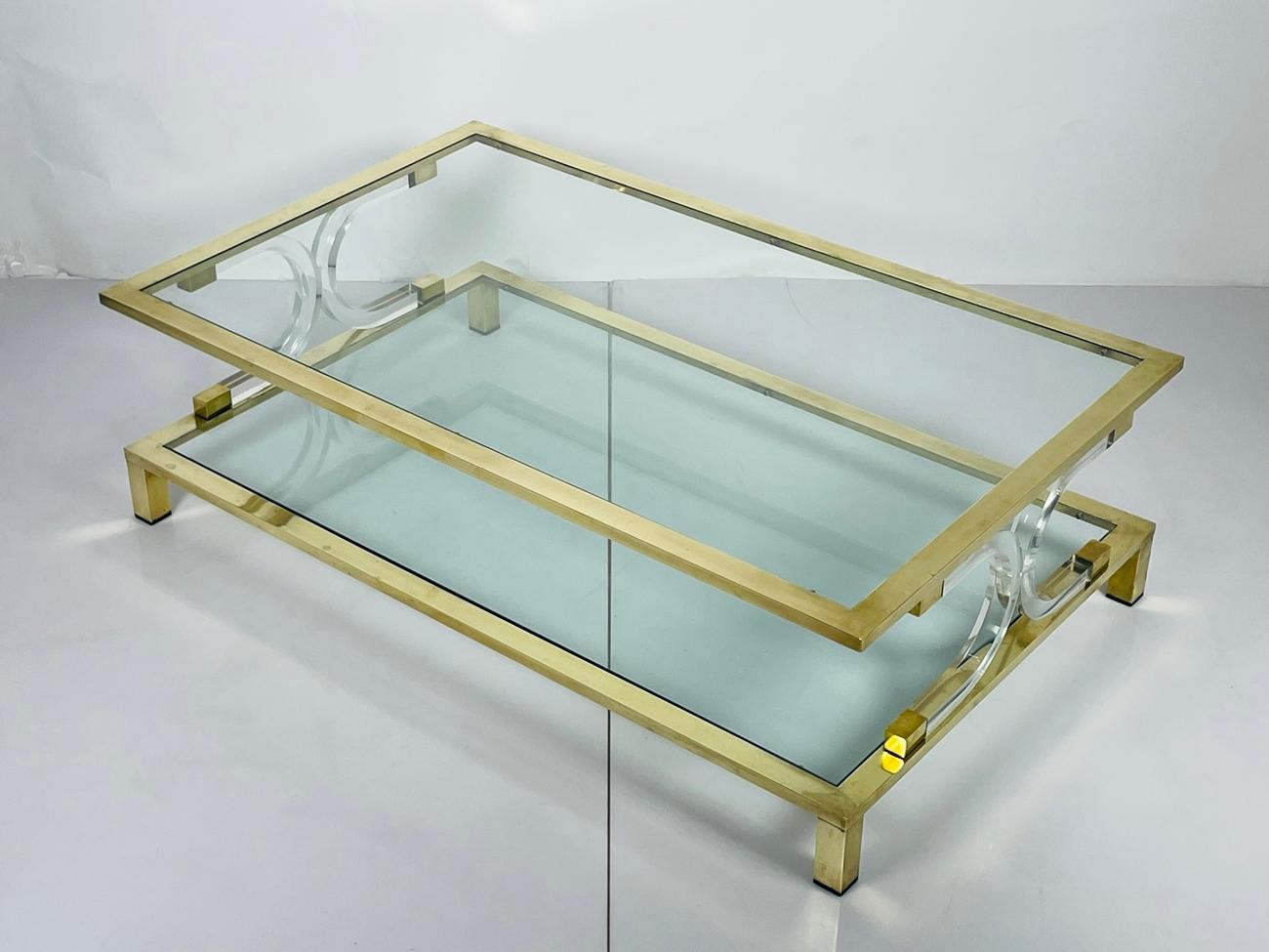 Mid-Century Modern Two Tier Lucite & Brass Coffee Table in the Style of Charles Hollis Jones. For Sale