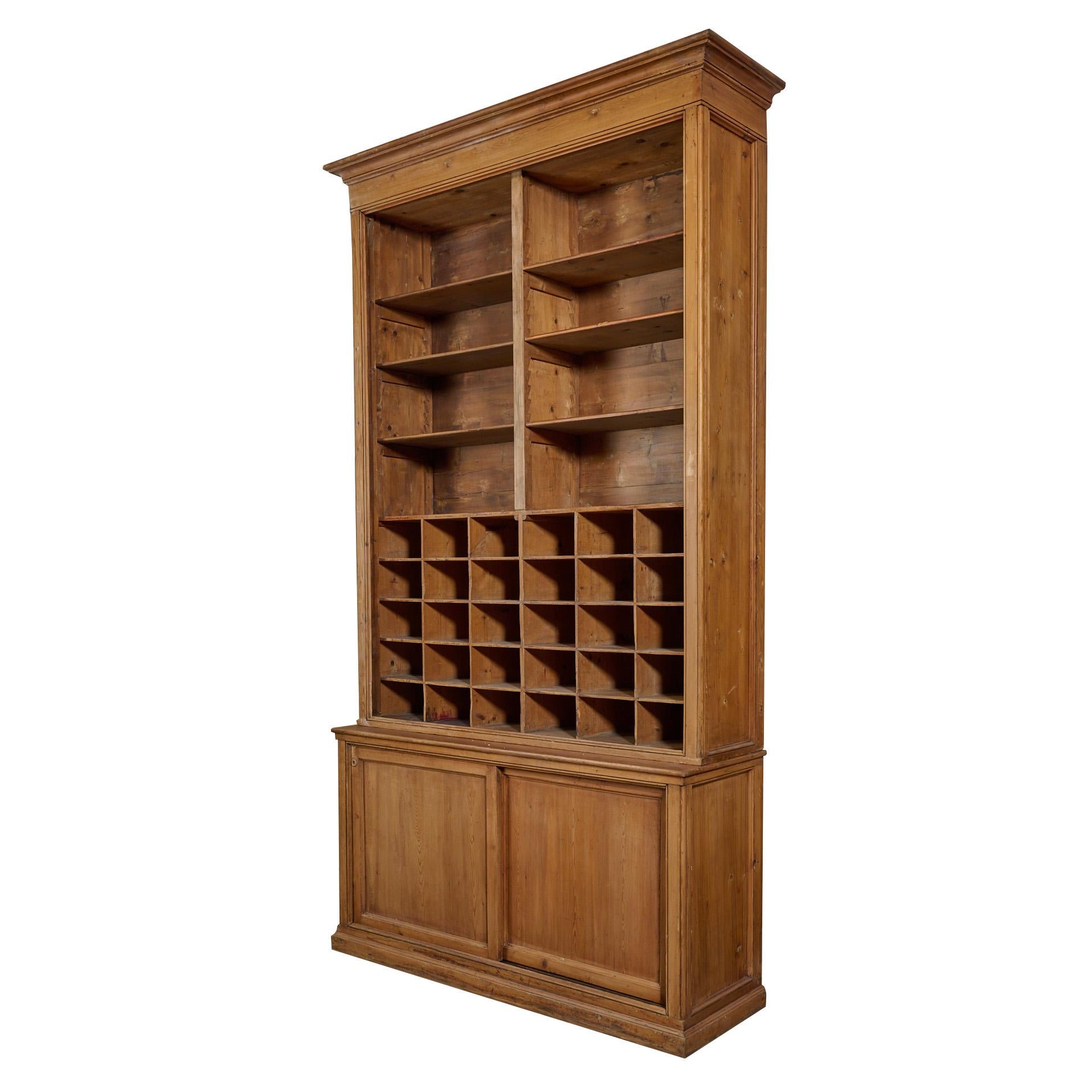 The best two tier pine cabinet with shelving, cubby holes, and base cabinet. Fantastic Quality. Two available, priced per single unit.