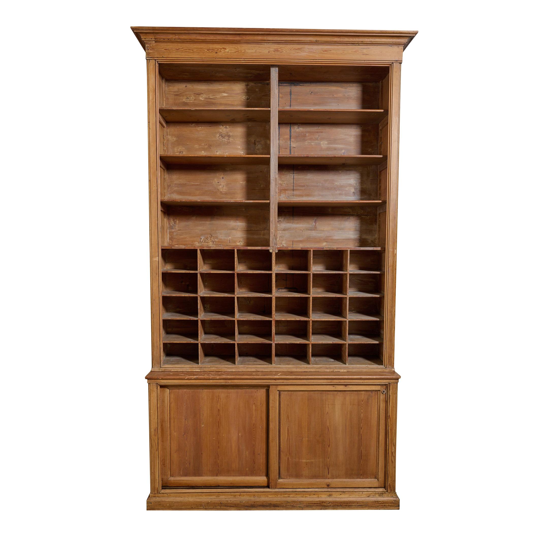 The best two tier pine cabinet with shelving, cubby holes, and base cabinet. Fantastic Quality. Two available, priced per single unit.