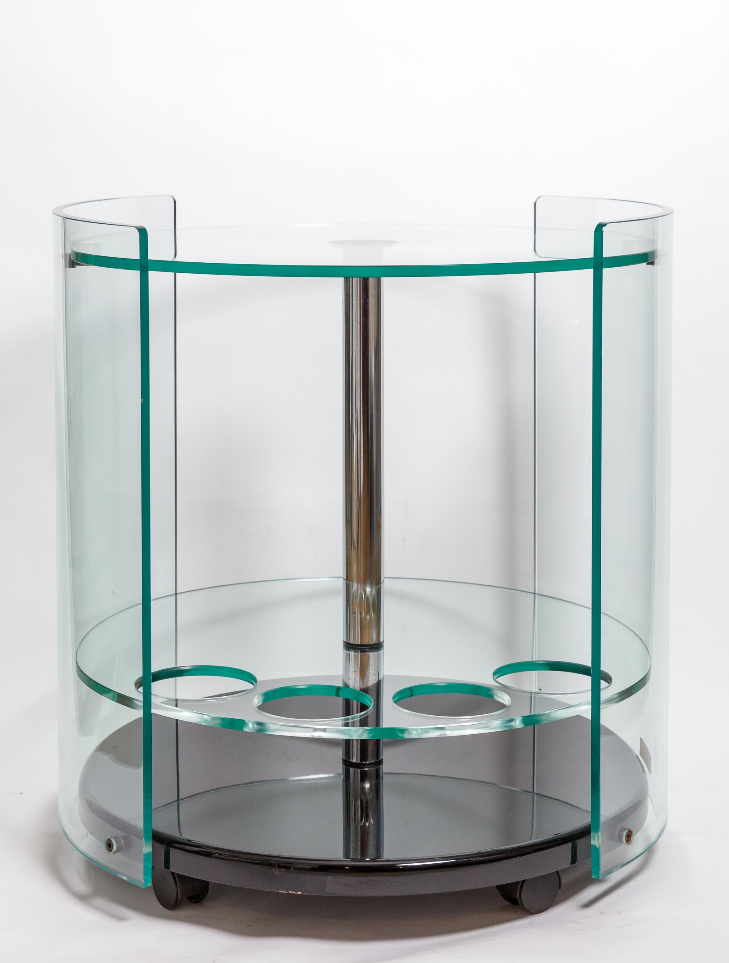 Two Tier Rolling Round Glass Bar Cart with Black Base and Chrome Detail In Good Condition For Sale In Bridgehampton, NY