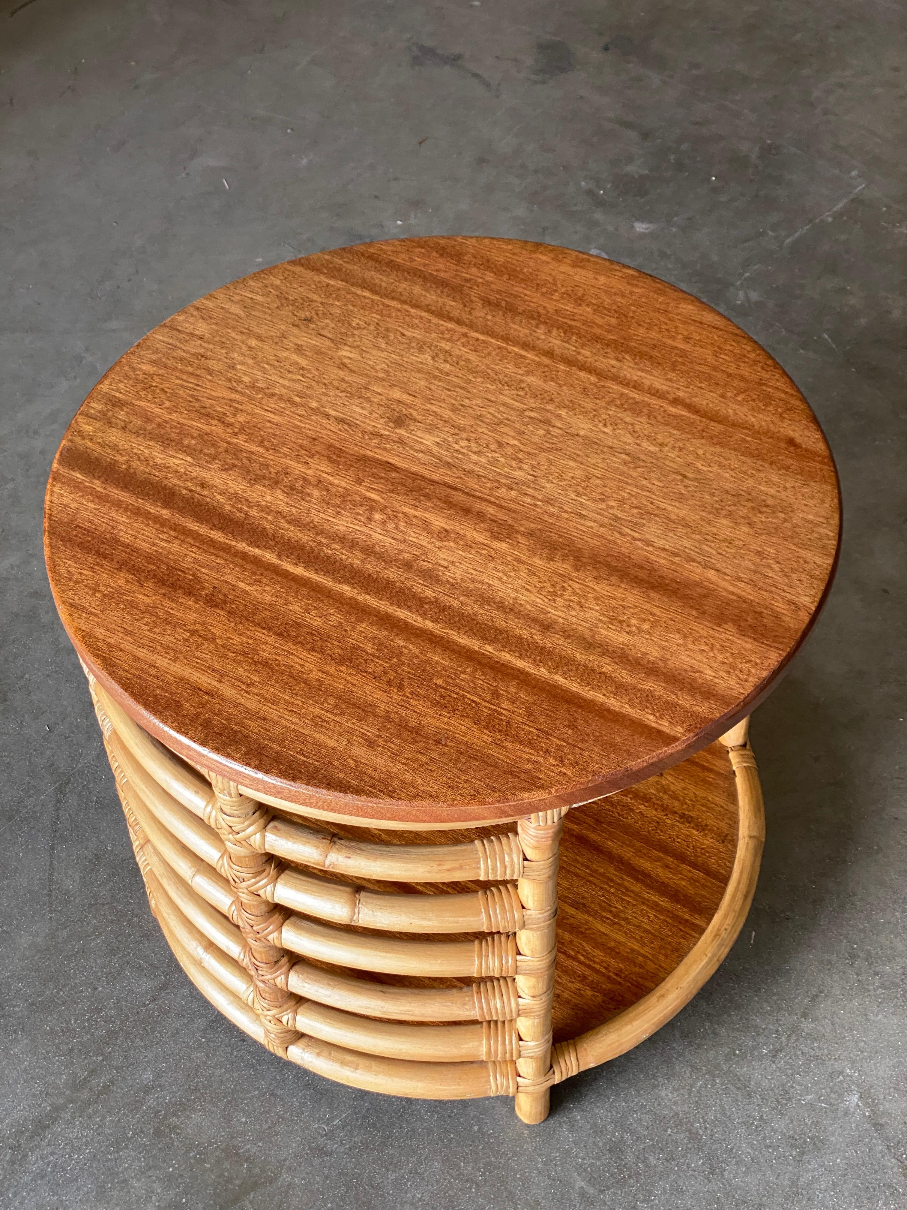 Restored Two-Tier Round Pole Rattan Side Table with Mahogany Top In Excellent Condition For Sale In Van Nuys, CA