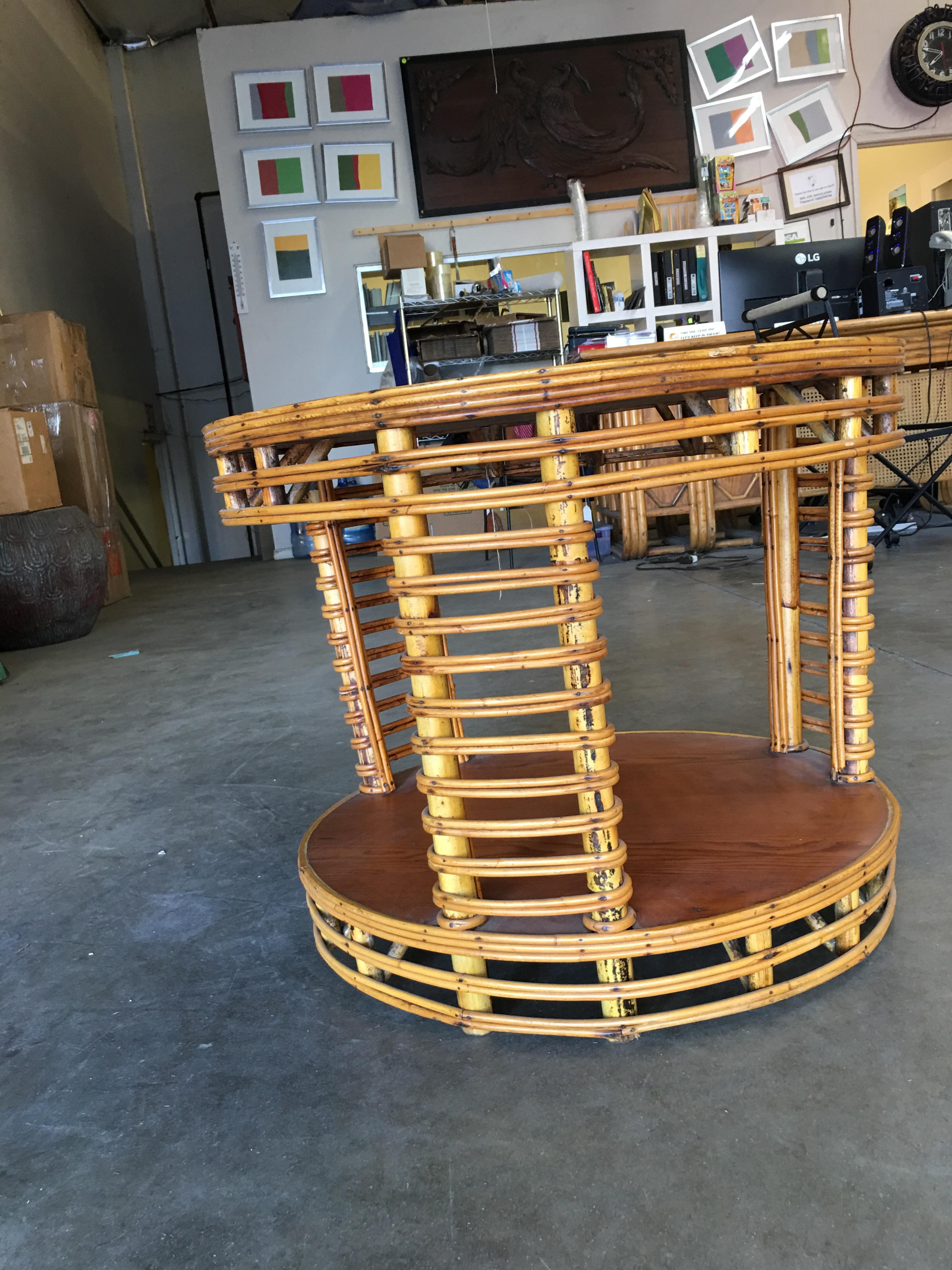 Two-Tier Round Stick Rattan Coffee Table with Mahogany Top In Excellent Condition For Sale In Van Nuys, CA