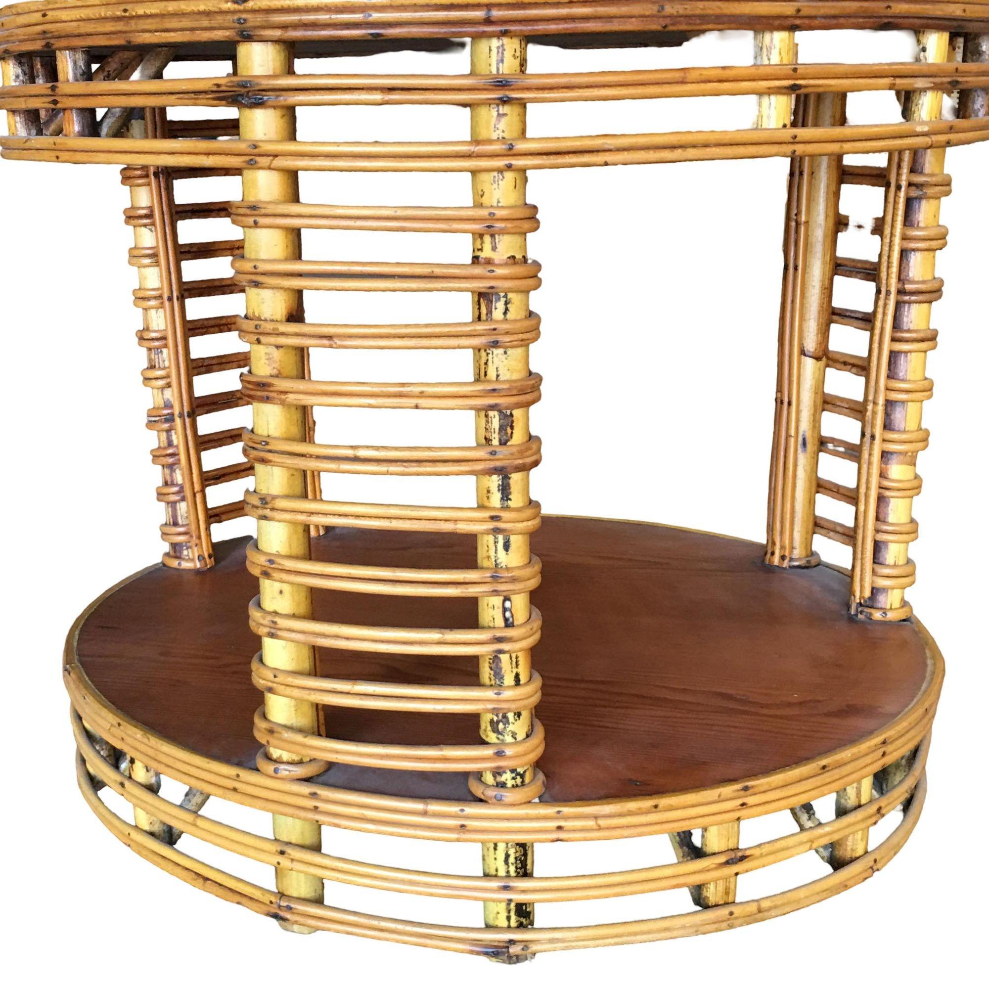 Two-Tier Round Stick Rattan Coffee Table with Mahogany Top In Excellent Condition For Sale In Van Nuys, CA