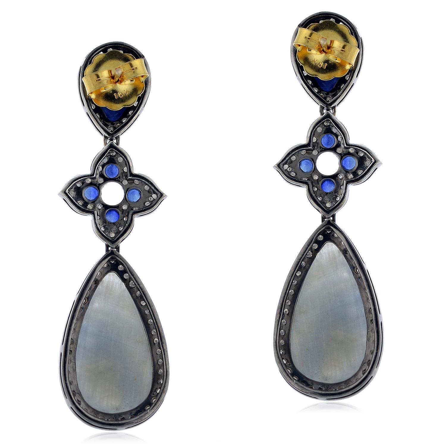 Two-tier Sapphire Earring with Diamond Motif in 18K Gold and silver is pretty and perfect to pair with semi-casuals and any fun event.

Closure: Push Post

18kt Gold:1.98gms
Diamond:1.6cts
Silver:8.2gms
Sapphire:27.2cts


