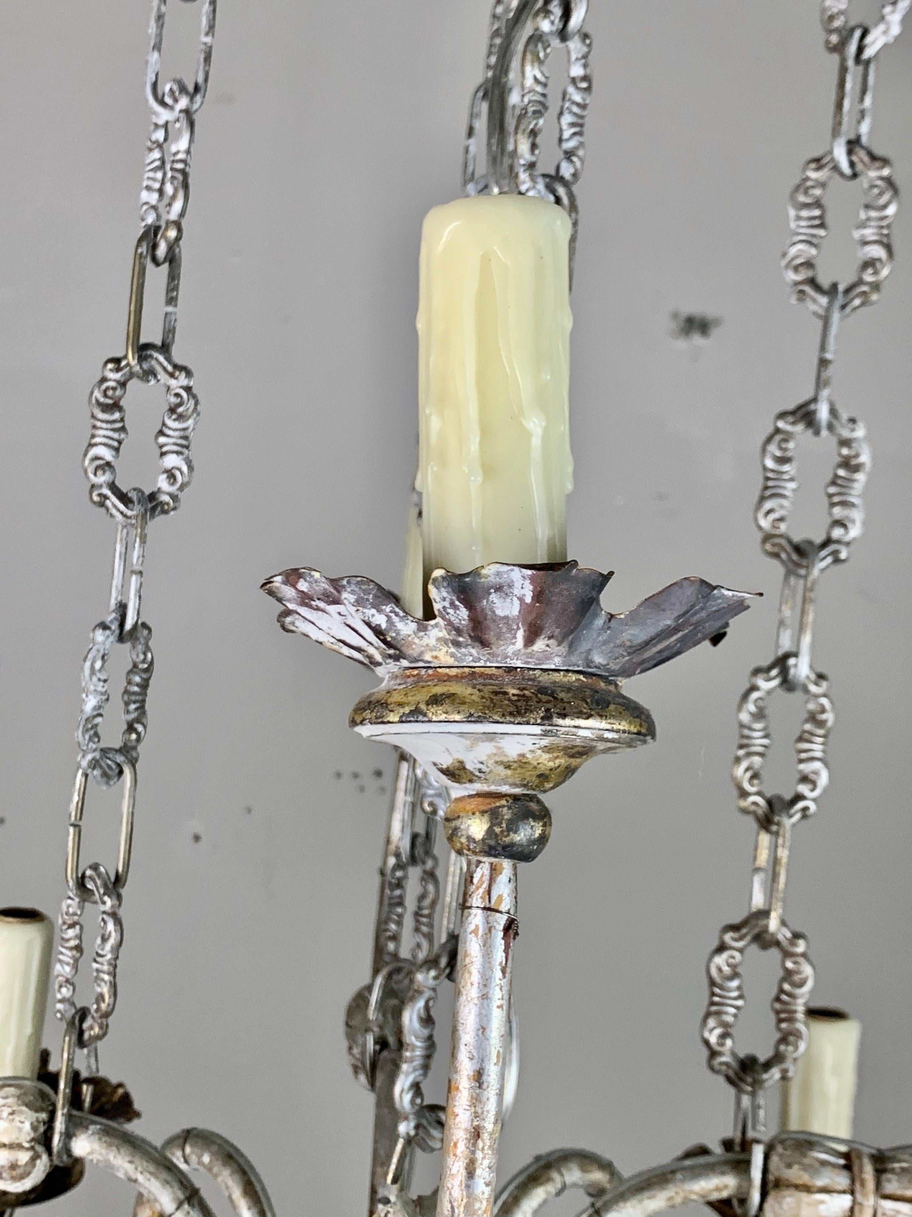 Two-Tier Silvered Wood and Metal Chandelier In Distressed Condition For Sale In Los Angeles, CA