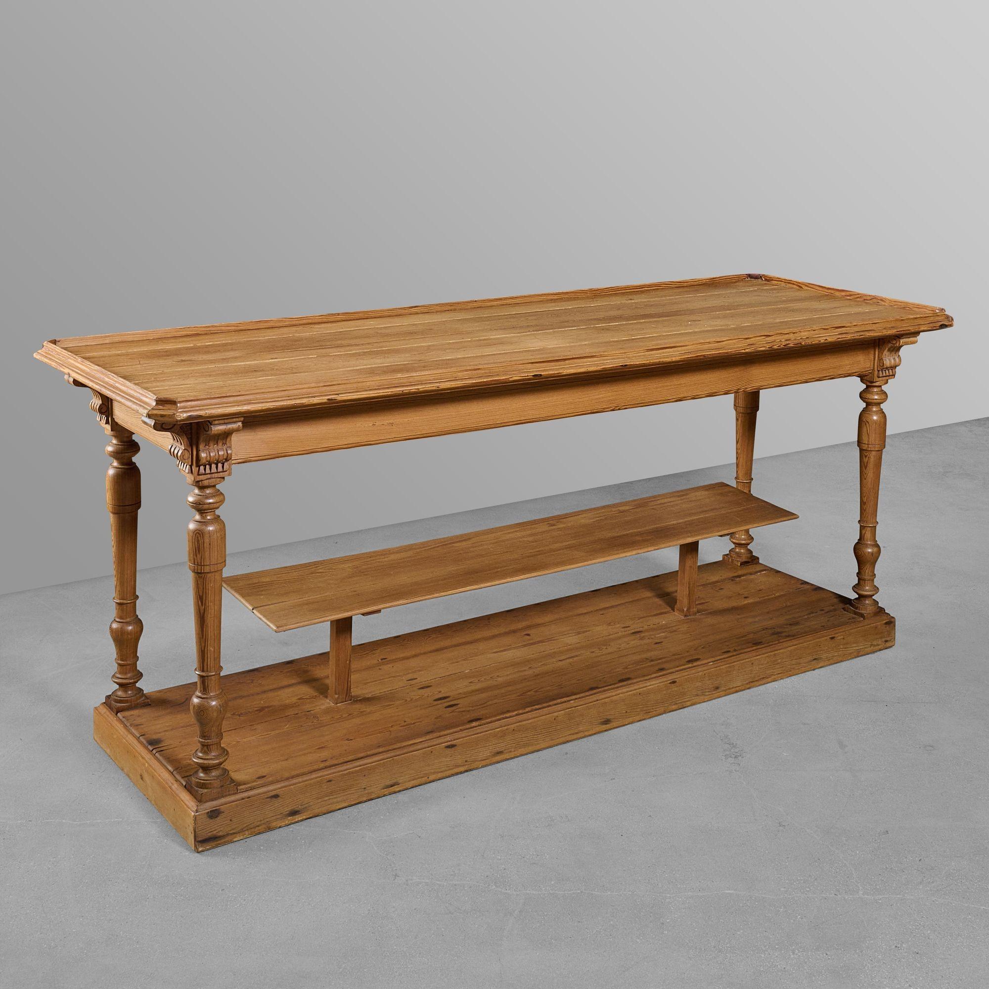 Tier pine table with great legs & cute center tier display shelf. From a Paris hat shop.