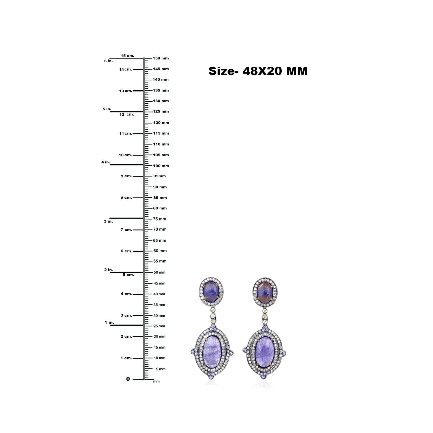 Pendientes colgantes de tanzanita de dos hileras con diamantes en oro de 18 quilates y plata en Nuevo estado para la venta en New York, NY