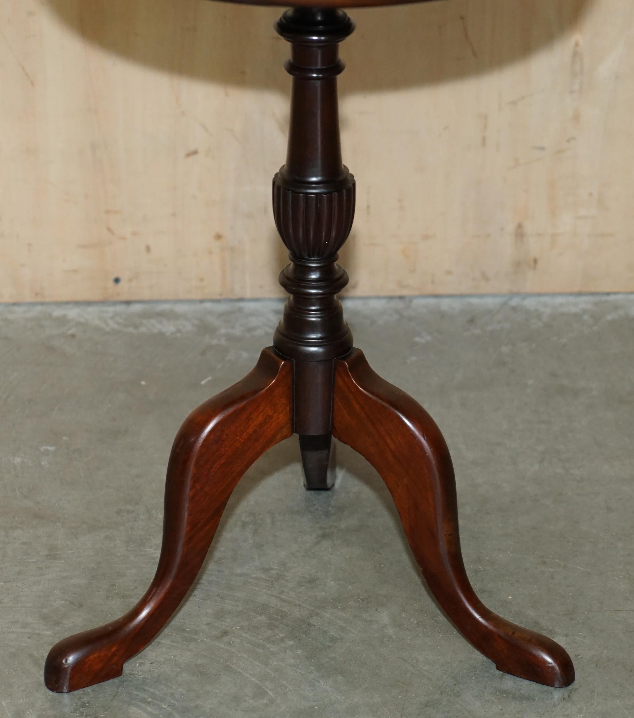 Early 20th Century TWO TIERED ANTIQUE HARDWOOD TRIPOD TABLE WiTH ROTATING MIDDLE SHELF For Sale