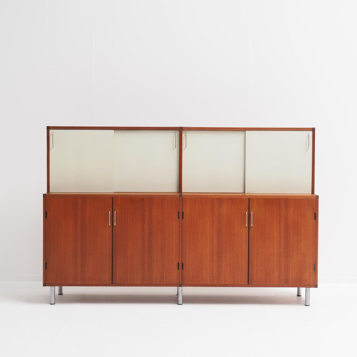 Beautiful double-decker cabinet designed by Cees Braakman for Pastoe. It comes from the 'Made to Measure' series that was produced in the Netherlands from the early 1950s to the mid-1960s.

With its diversity in height, colour and use of materials,