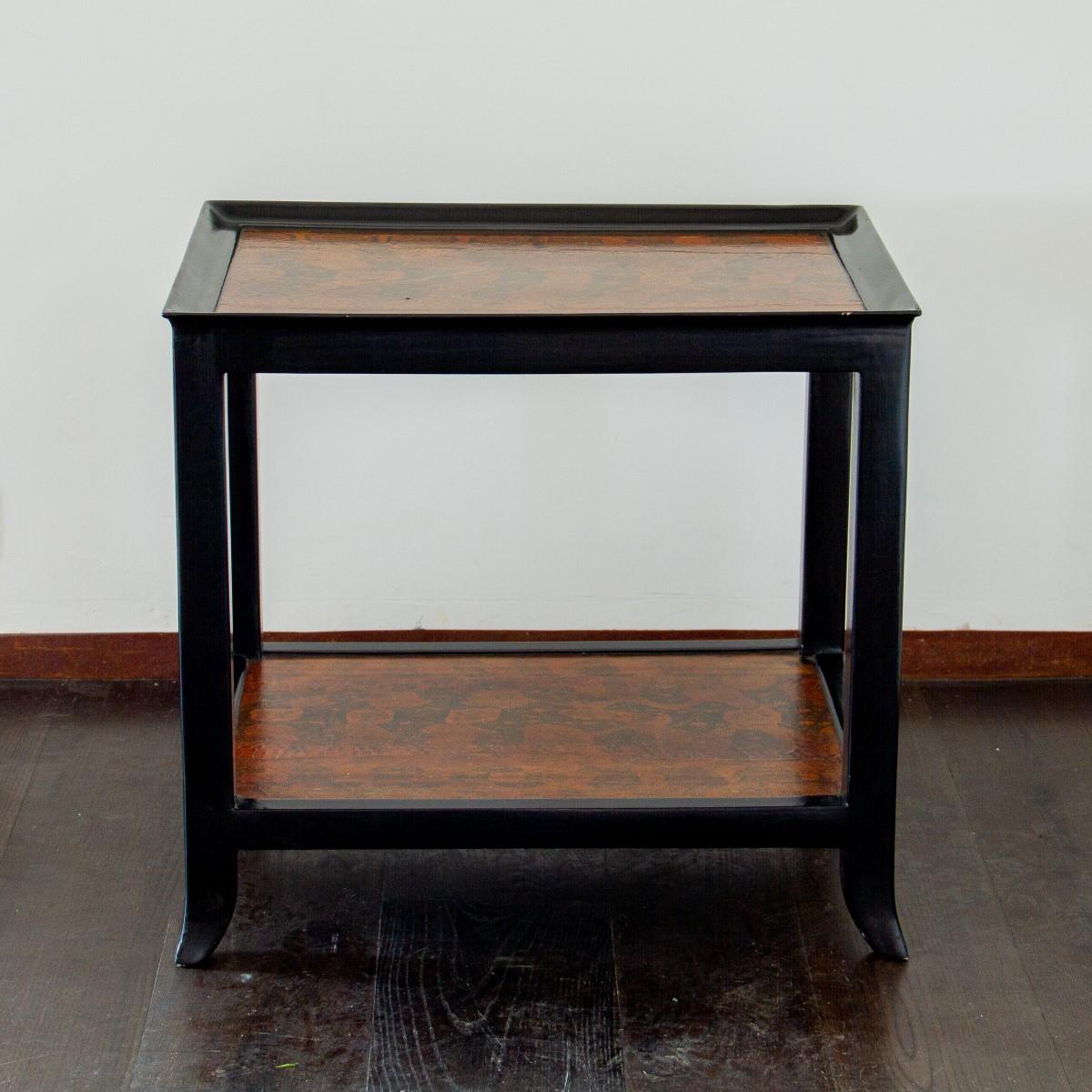 American Two Tiered Ebonized and Faux Python Skin Occasional Table, 1970s