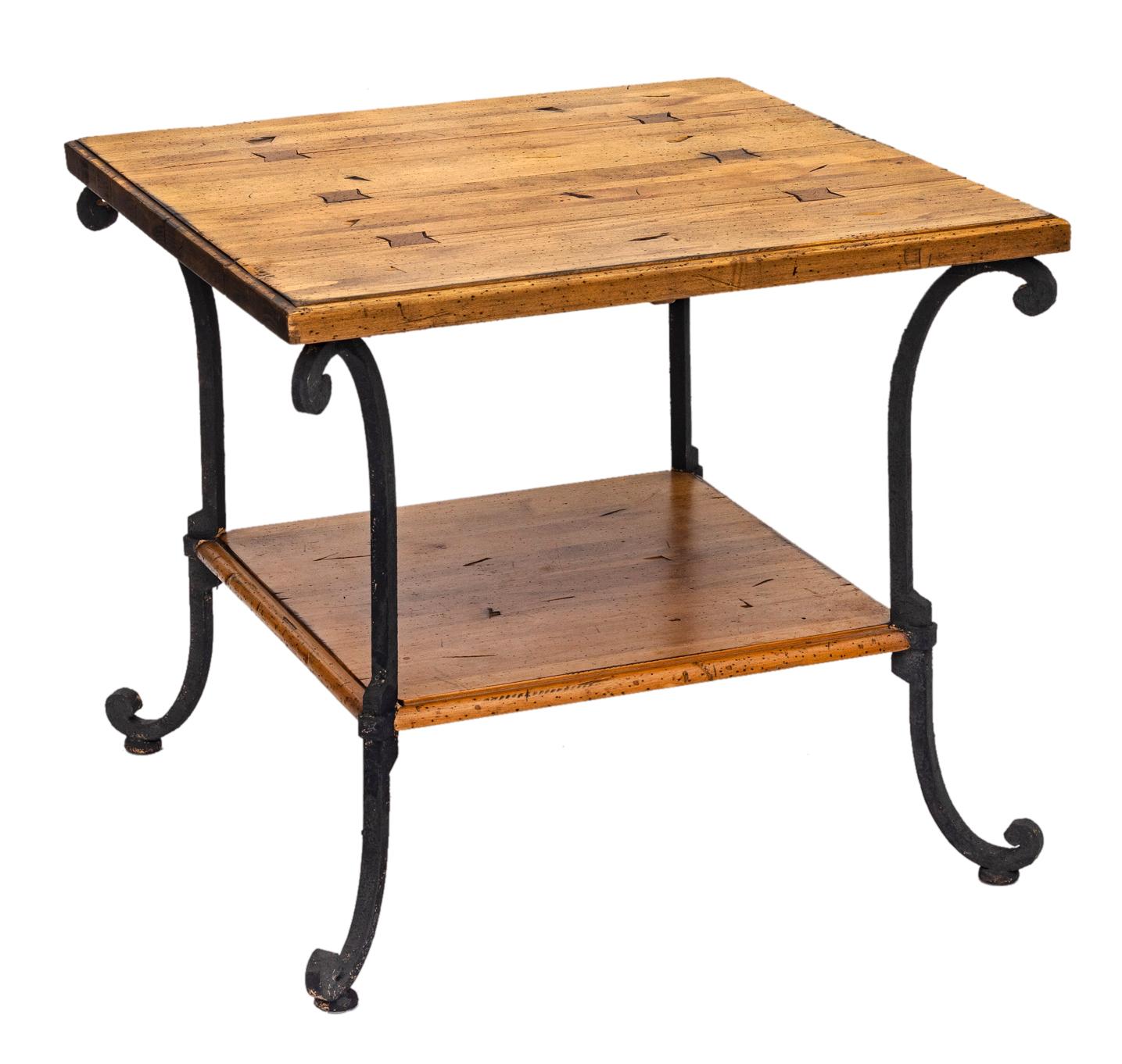 Handcrafted pine table with handwrought iron frame & lower shelf.
Finished in a smooth natural brown distressed finish on the wrought iron legs & frame.
Manufactured using time-honored techniques to create a superbly crafted old-world reproduction.