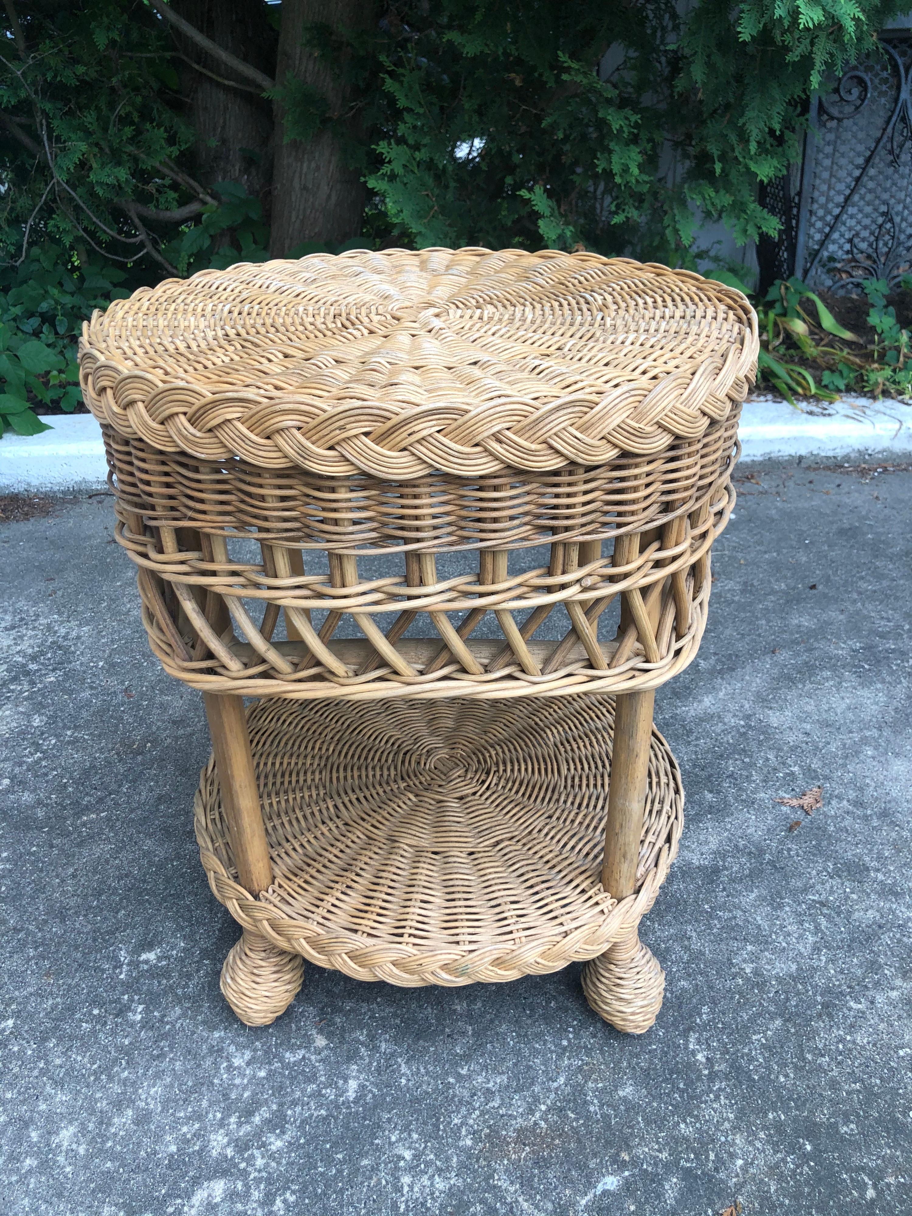 This item has sold 

Two tiered wicker side table. Perfect for that indoor porch or covered patio.
This itetm can parcel ship for around $45