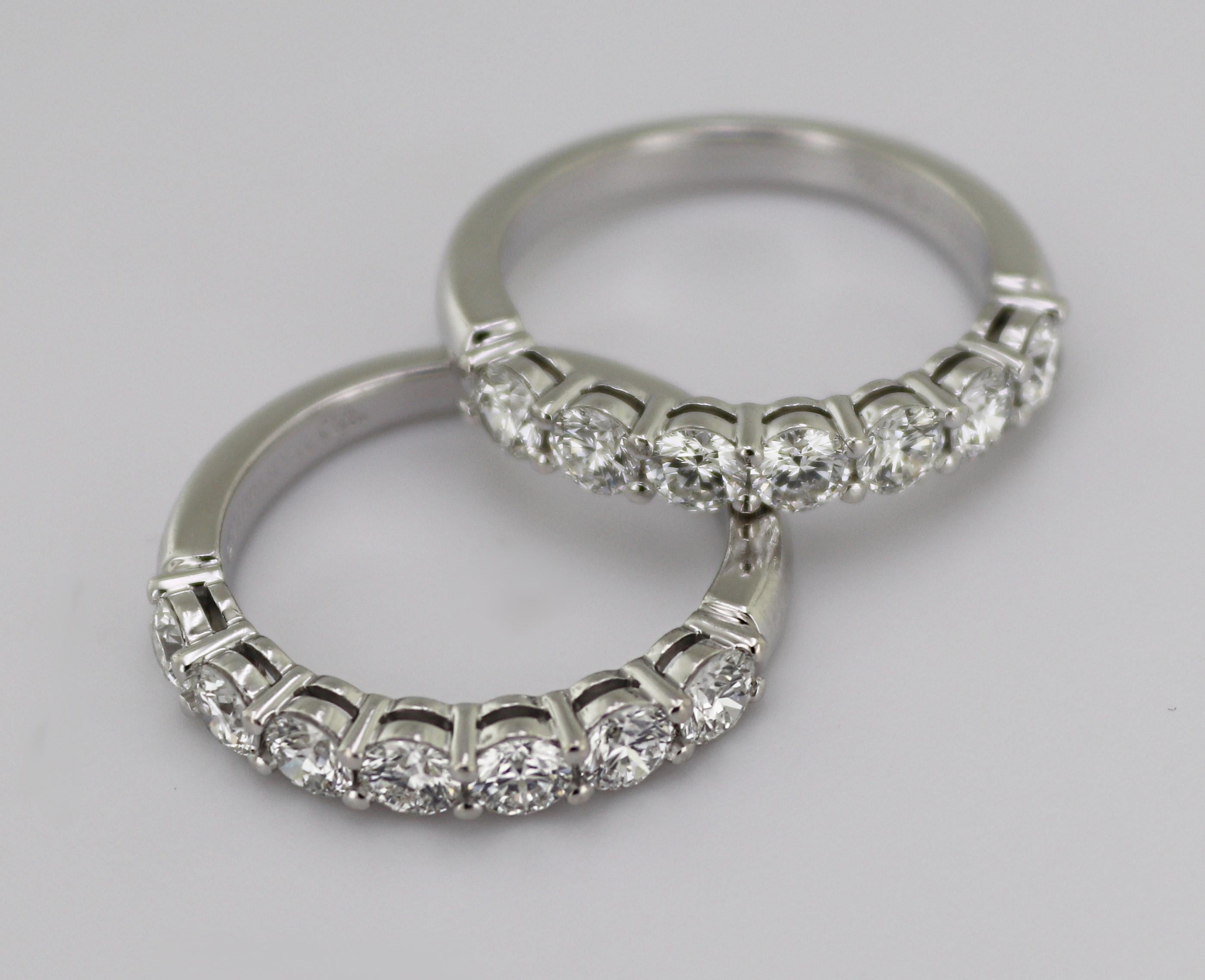 Comprised of (2) matching Tiffany & Co diamond and platinum, 3.5 mm,
“Embrace” bands, each feature (7) full-cut diamonds, 0.91 ct. tw., VS, G-H,
total diamond weight for both rings 1.82 cts., tw., both size 6 and both

marked; ©Tiffany & Co, 950,