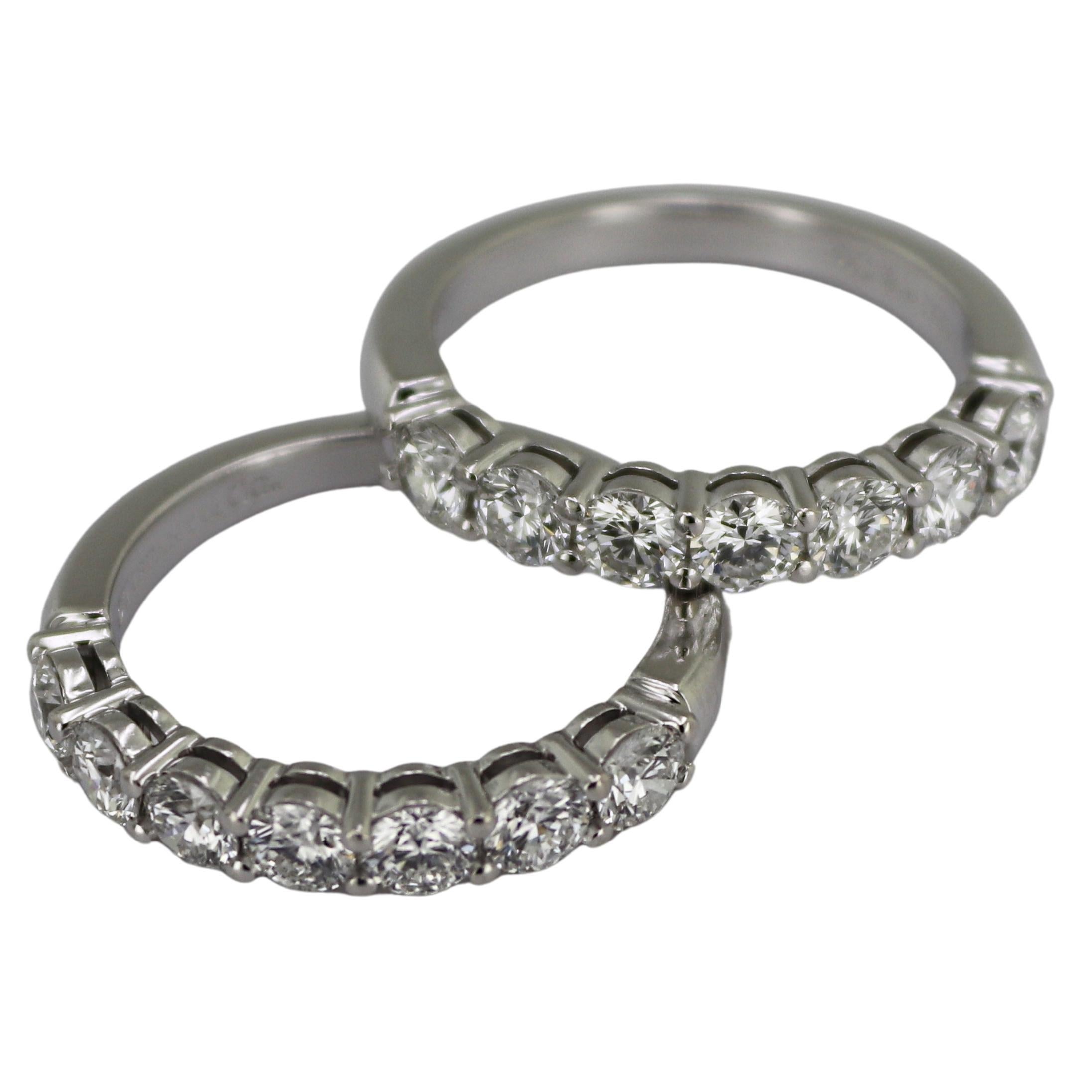 Two Tiffany & Co “Embrace” Diamond, Platinum Band Ring Set For Sale