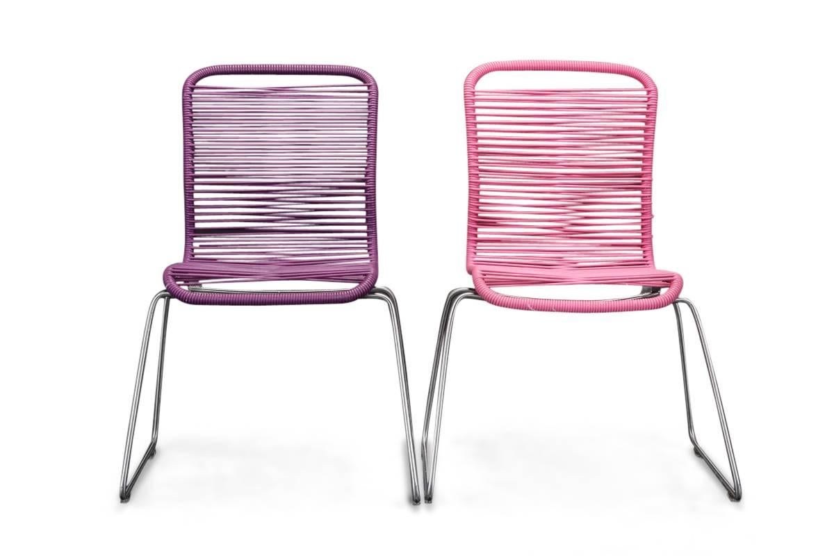 Verner Panton. Two Tivoli chairs for children. Set of brushed stainless steel, seat and back in palm woven with polyurethane cord, reinforced with a nylon core. Designed circa 1955. Produced by Montana. Measure: Seat height approximate 32 cm. H 60,
