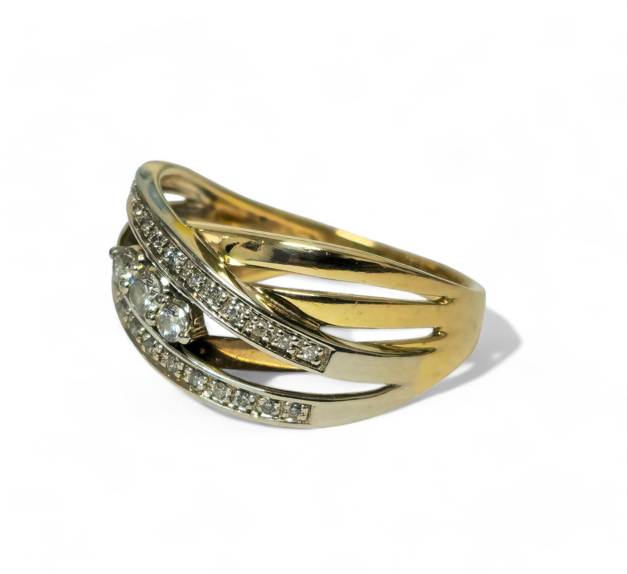 Crafted from 10k yellow and white gold, this vintage diamond wedding band features a total of 0.40 carats of round-cut diamonds, exhibiting SI2 clarity and F-G color. Weighing 4.50 grams, it offers a comfortable fit for US size 7.75, with