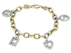 Two-Tone 14 Karat Gold Oval Link Multi-Charm Bracelet with Floating Diamonds