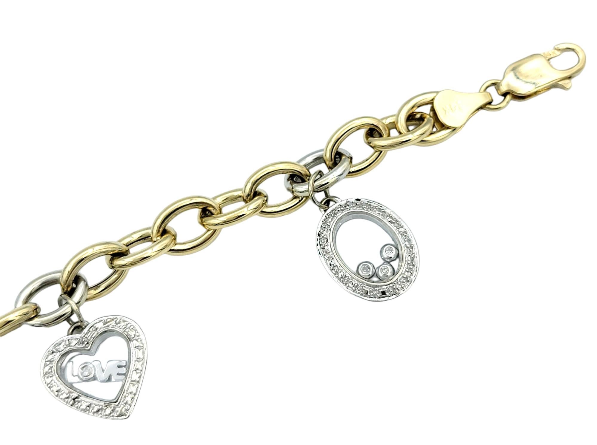 Contemporary Two-Tone 14 Karat Gold Oval Link Multi-Charm Bracelet with Floating Diamonds