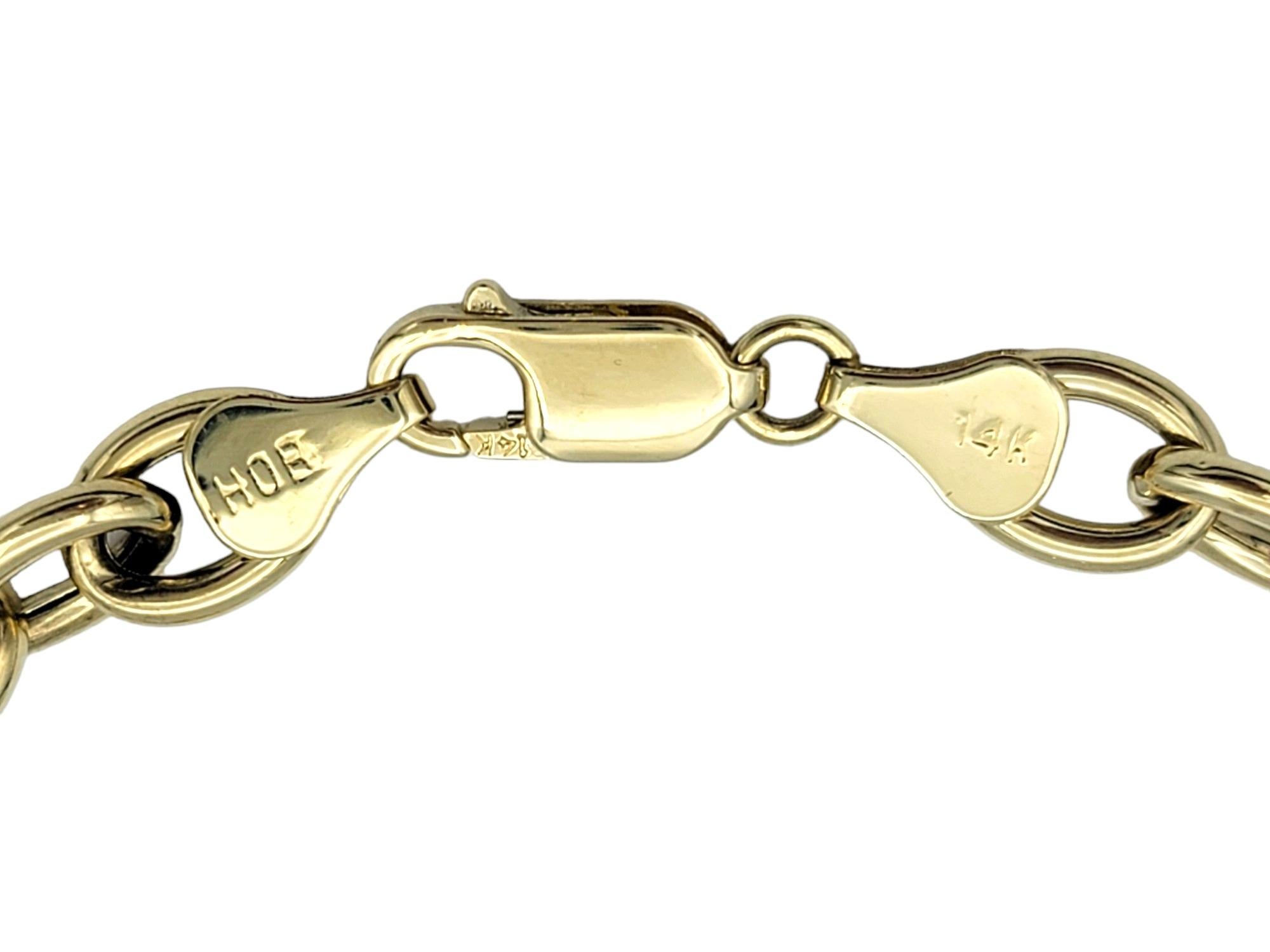 Women's Two-Tone 14 Karat Gold Oval Link Multi-Charm Bracelet with Floating Diamonds