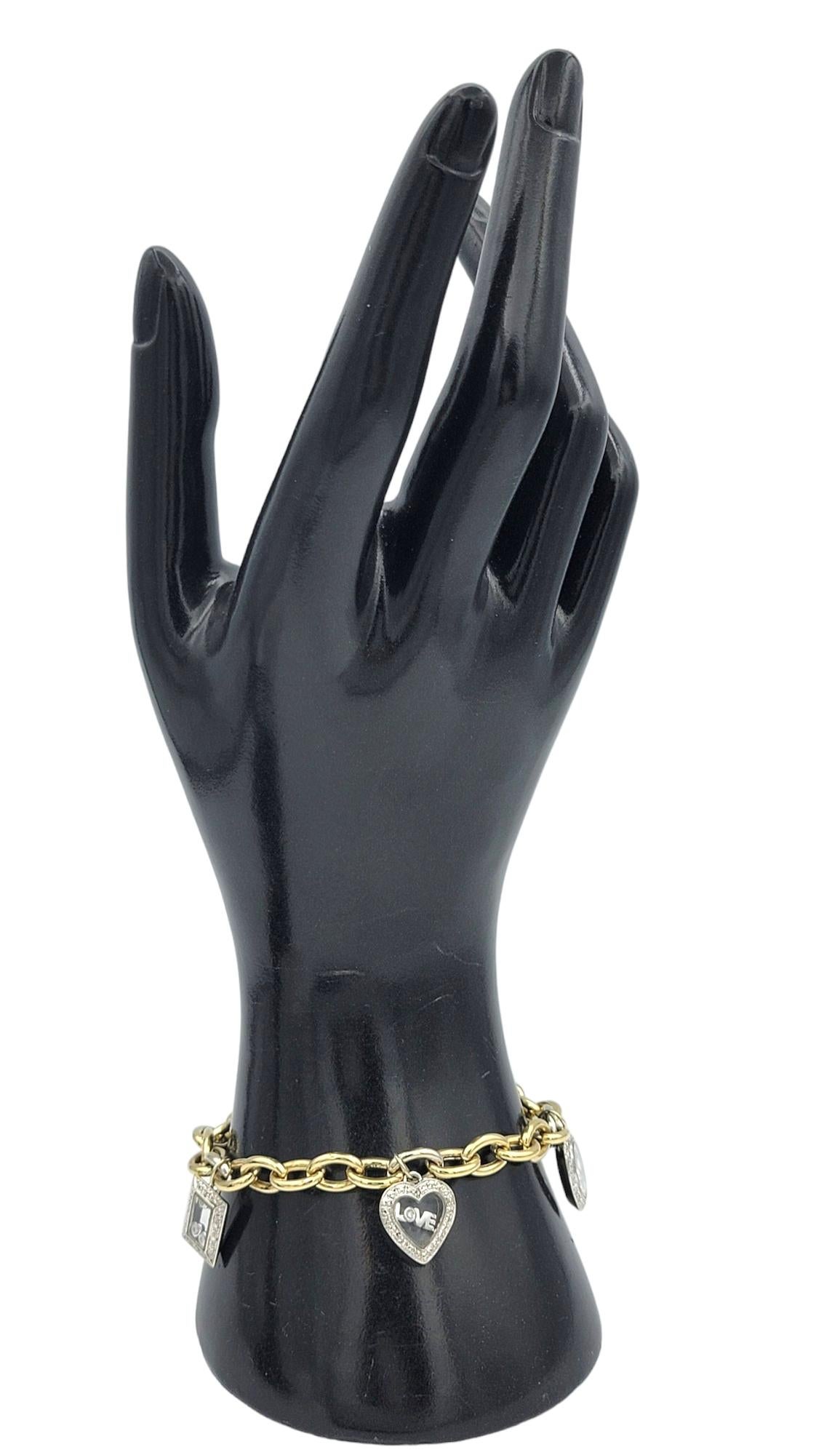 Two-Tone 14 Karat Gold Oval Link Multi-Charm Bracelet with Floating Diamonds 2