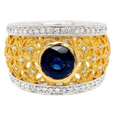 Two-Tone 18 Karat Gold Italian Diamond Ring with Blue Sapphire Center Stone