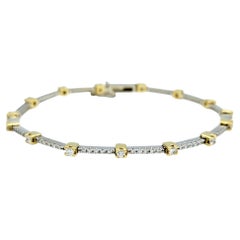 Bracciale a maglie strette con diamanti rotondi e brillanti in oro 18 carati a due toni