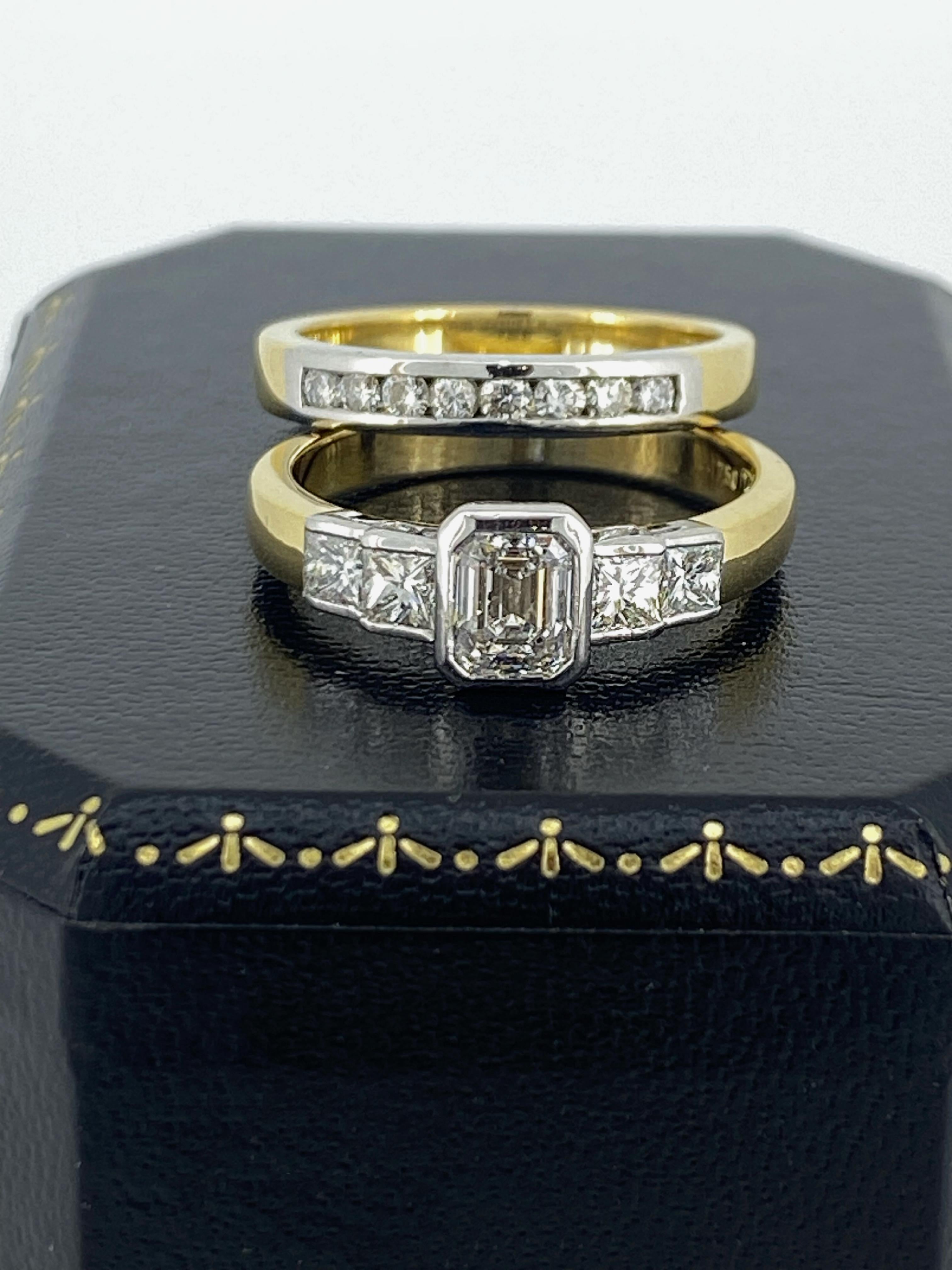 Make your special day even more unforgettable 
with this stunning handmade 18K White & Yellow Gold Wedding Set...

Comprising of: 

1. A gorgeous Engagement Ring,
centrally set with bezel set Diamond 
of desirable emerald cut, 
of impressive size of