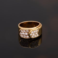 Anillo bicolor de oro amarillo y oro rosa de 18 quilates con diamantes