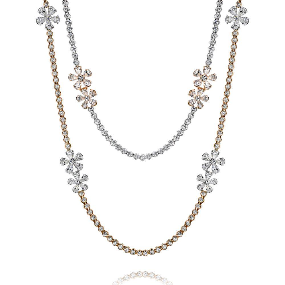 La collana di diamanti in oro bianco e rosa 18 carati contiene 21,34 carati di diamanti.

Questo prodotto è corredato da un certificato di valutazione
Questo prodotto sarà confezionato in una scatola personalizzata

Composizione:
Oro bianco e rosa