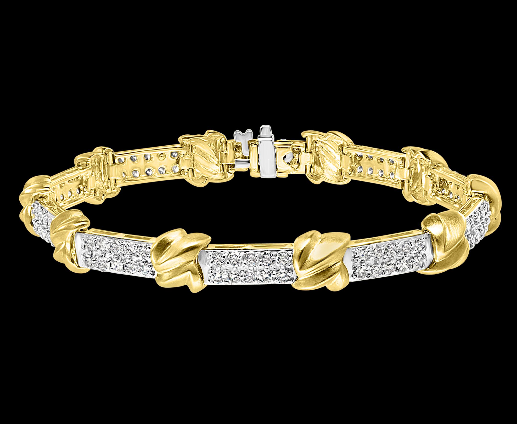 A statement of true, classic elegance, this 14 karat two tone Gold  Bracelet with Pave Diamond  from signature collection. The interlocking gold links, in between diamonds   provide flexibility with a fabric-like movement. This makes for a very