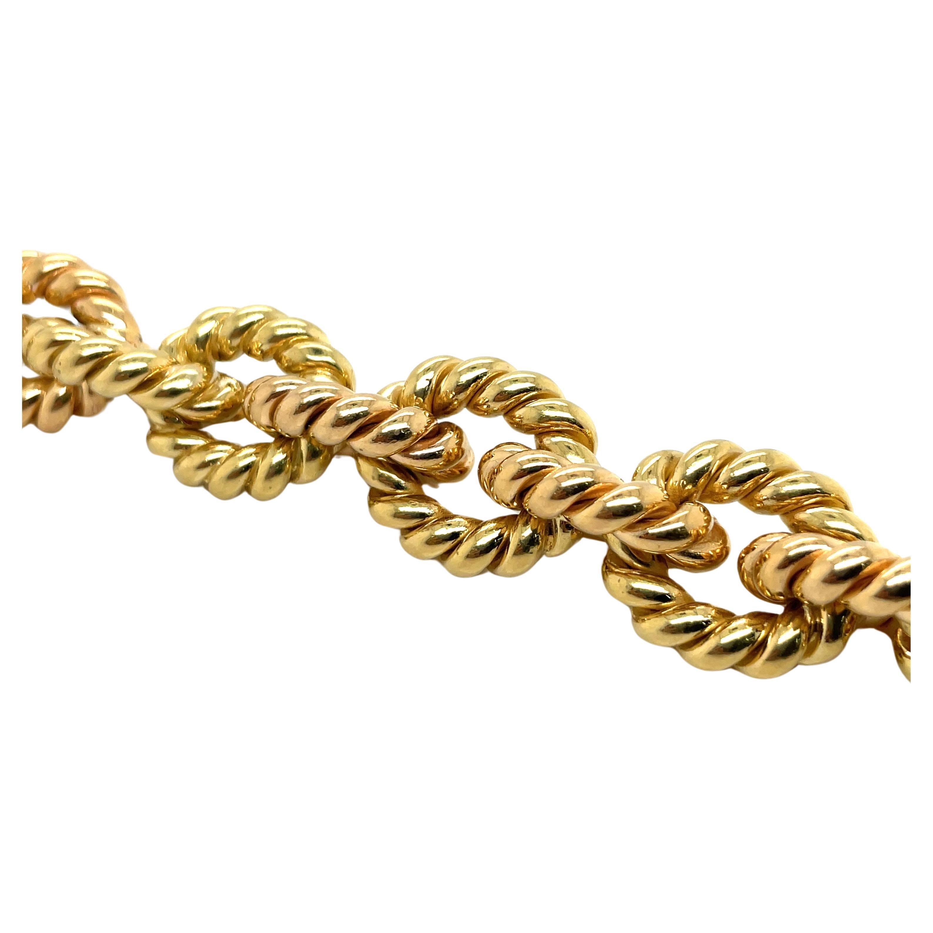 Pulsera de eslabones retorcidos alternados en dos tonos de oro amarillo y rosa de 18 quilates 68 gramos en venta 1