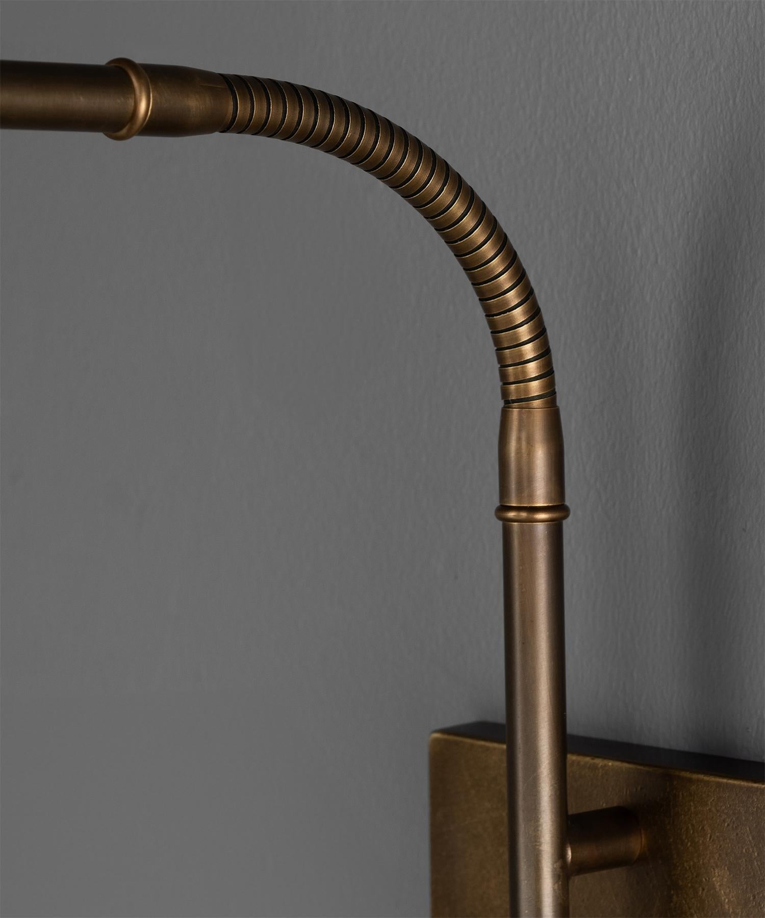 Made in Italy
Black metal shade with brass arm and mount.
7.5
