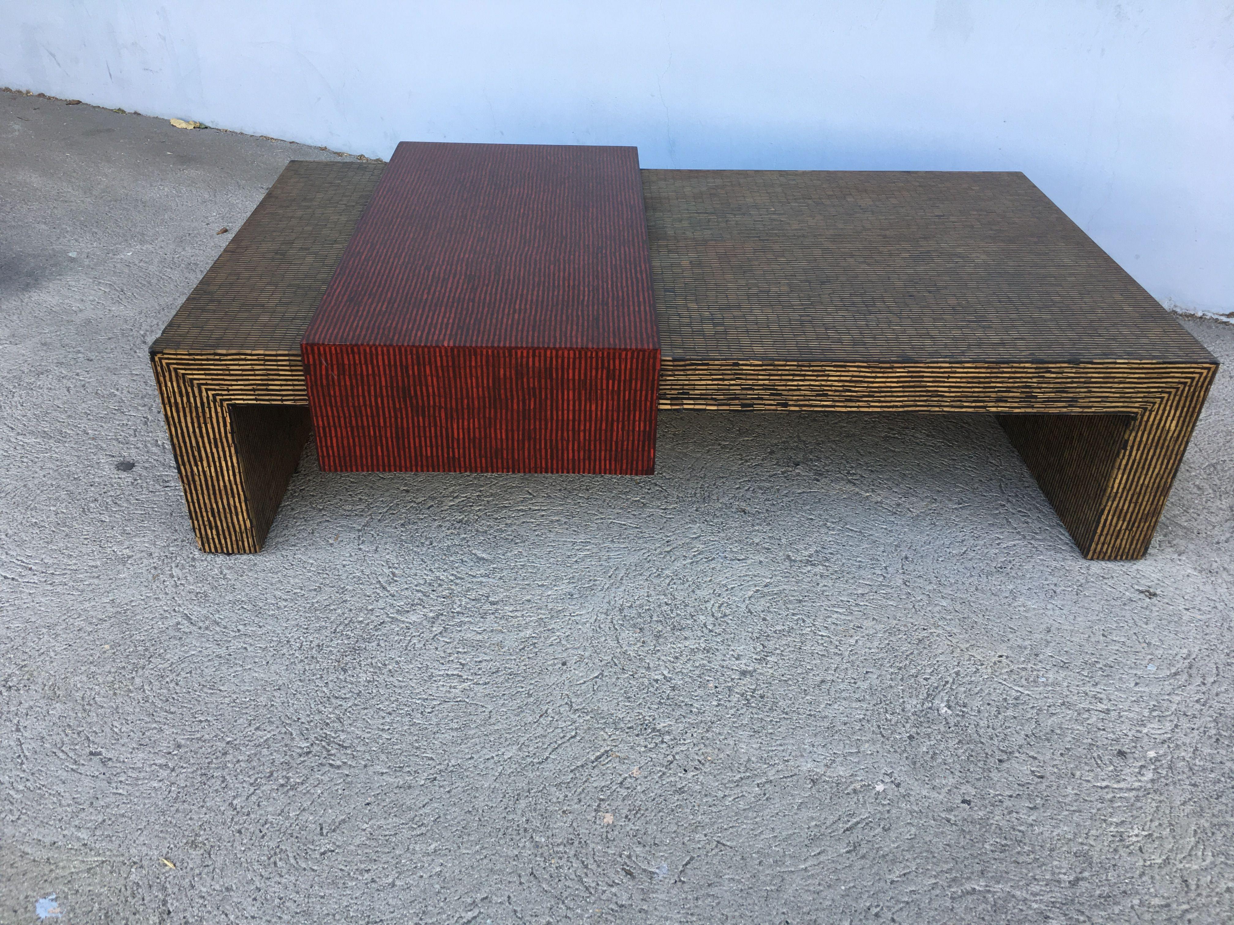 Two-tone cubist style coffee/cocktail table with red and tan textured vinyl tops. Matching side tables available search 