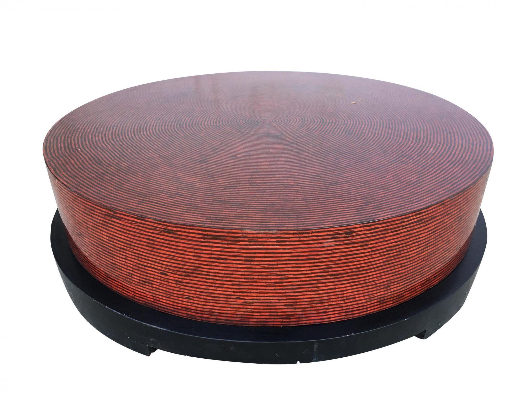 Pair of v round side table and coffee table with red and tan textured vinyl tops.

Circa 1990

Measures: Coffee table Height: 12 in. X diameter: 44 in.
Side tables: Height: 20 in. X diameter: 22 in.