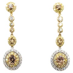 Orecchini a cerchio pendenti bicolore in oro 14 ct.