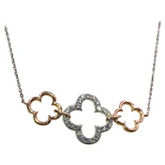 Two-Tone Diamond and Gold Pendant Two-Tone Diamond and Gold Pendant