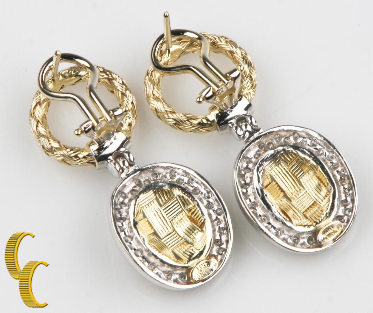 Gorgeous 14k White and Yellow Gold Earrings
Feature Delicate Basket Weave Design Set w/ White Gold Round Diamond Bezel
Hang from Woven Wreath Gold Hoop
Total Length of Drop = 38 mm
Width of Plaque = 16 mm
Diameter of Hoop = 15 mm
Total Mass = 12.8