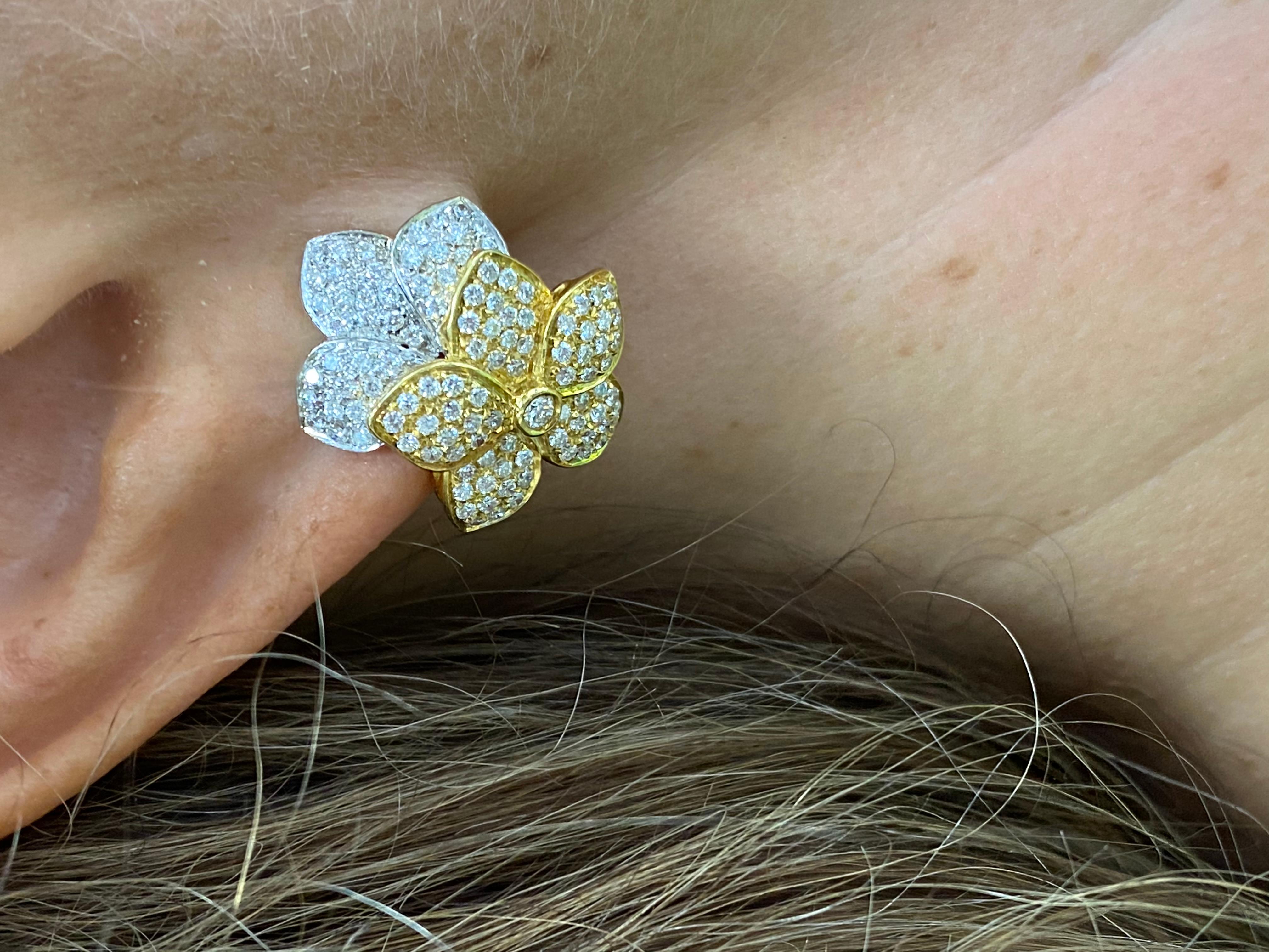 18K Two-tone diamond earrings, features 3.00 carats of Round brilliant cut diamonds. 
The diamonds are near colorless white slightly included. 

Designed by Laboratory. 