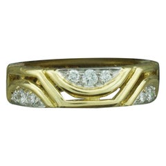 Two-Tone Diamond Eternity Ring in 18 Karat White and Yellow Gold