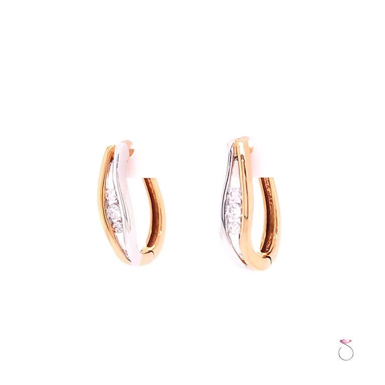 Tow tone Diamond hoop earrings in 18k white and rese gold. These beautiful earrings feature three channel set diamonds on each side. A total of six (6) natural round brilliant cut diamonds totaling approximately 0.14 carat. The diamonds are G - H in
