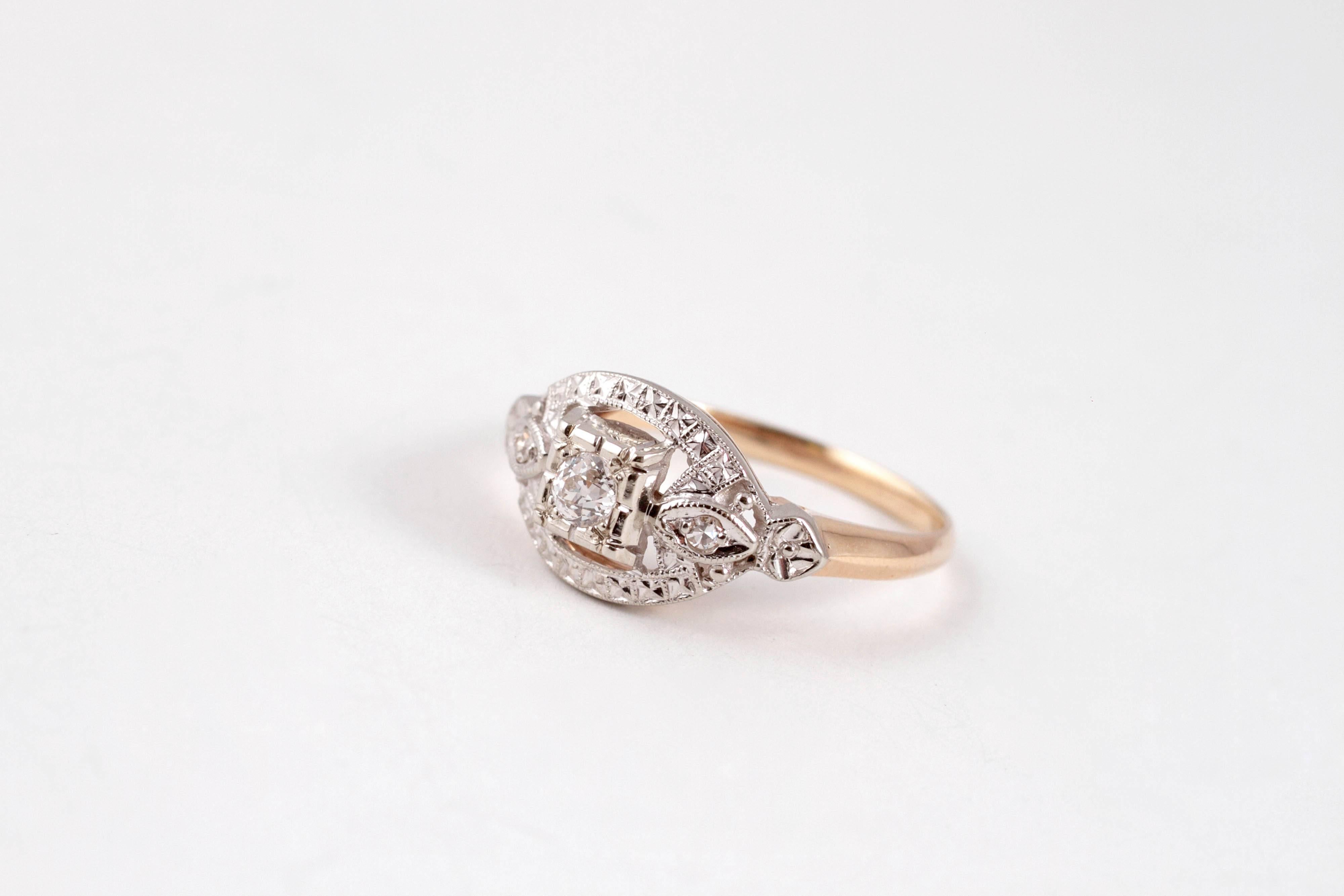 Simple and lovely!  In 14 karat two tone, this versatile beauty can be worn with any complementing jewelry!  Size 3 1/2