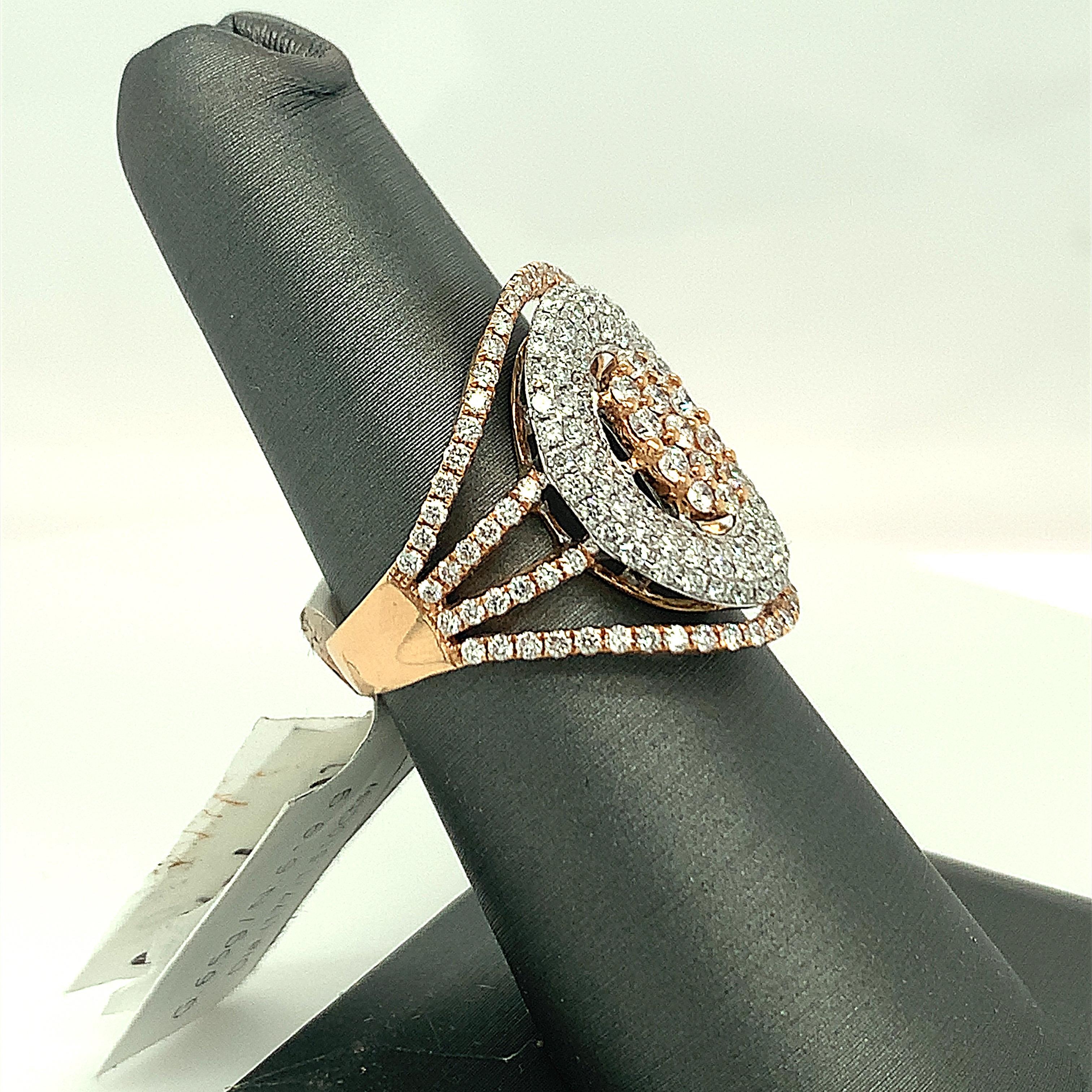 Natural pink and white diamonds set in 18K White and rose gold is well crafted ring, Total Weight. is 1.51 Carat and number of diamonds is 177 .Split sank bands has diamonds.


