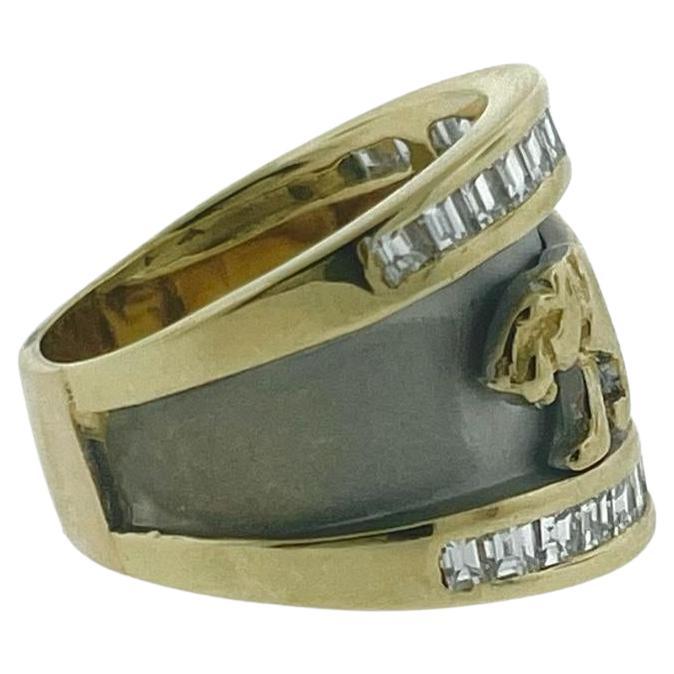 Make a statement with this two tone white gold/yellow gold panther ring! 

This ring holds twenty-eight (28) baguette cut diamonds weighing 1.25ctw (D-F/VS)

The ring is sized at 6.25 but can get resized to your specific measurements. 

